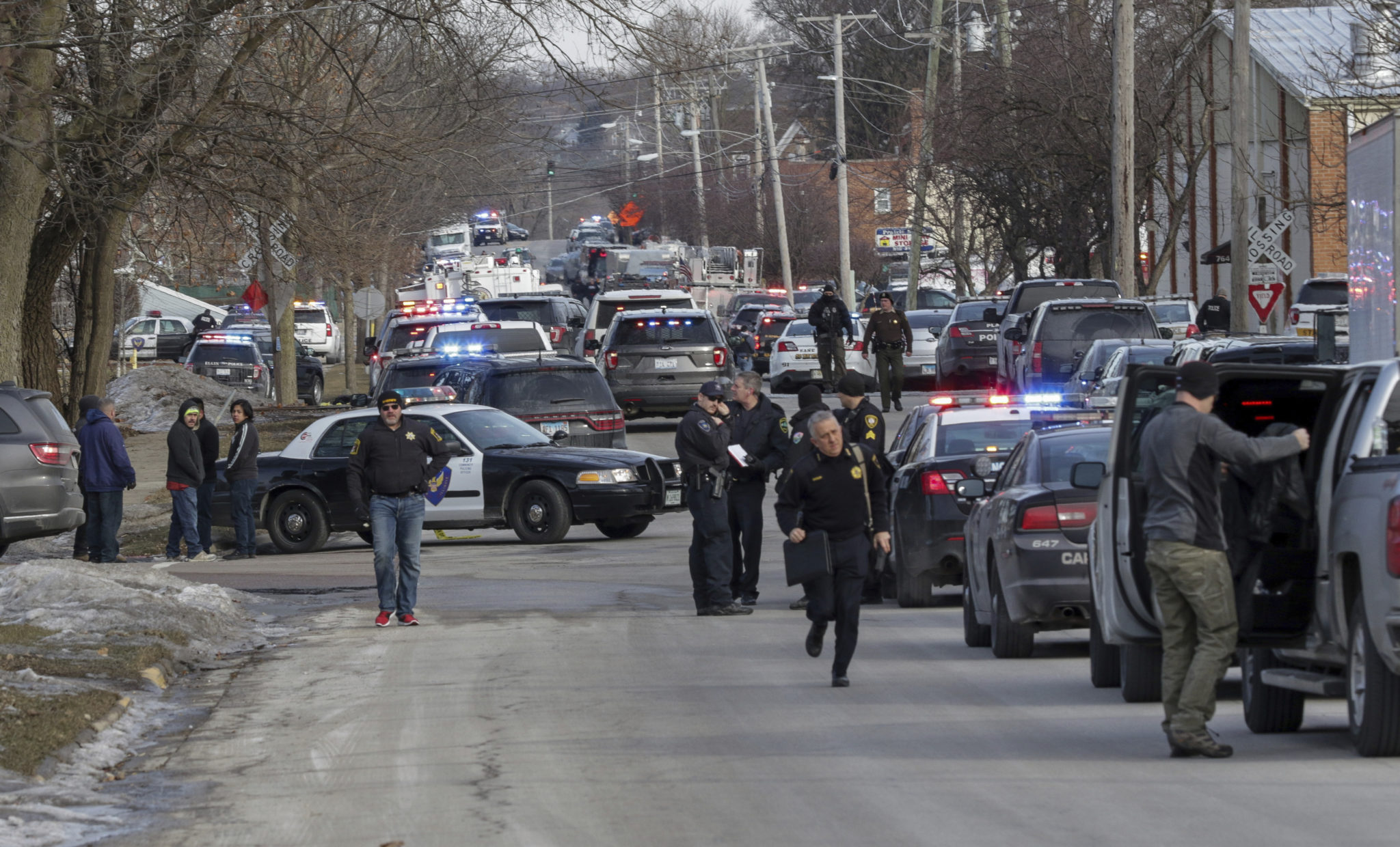 Five dead and several injured after gunman opens fire in Illinois ...
