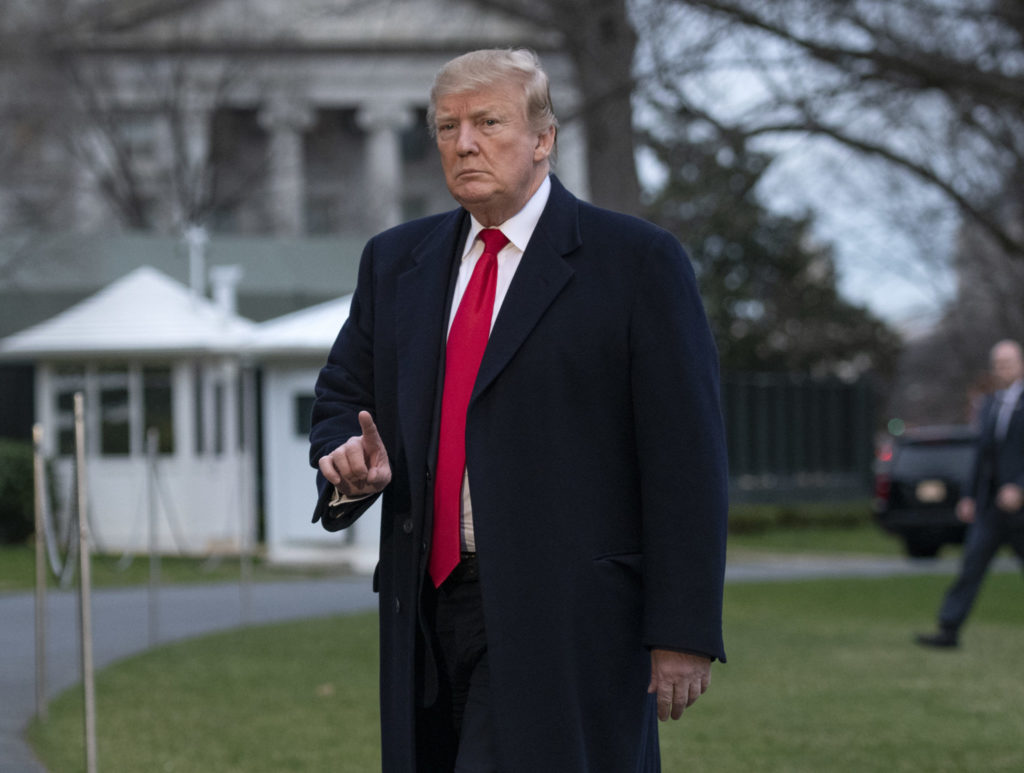 United States President Donald J. Trump gestures towards the press as he returns to the White House in Washington, DC following a weekend in Mar-a-Lago, Florida on Sunday, March 24, 2019. Earlier in the day US Attorney General William P. Barr released a summary of the long-awaited Mueller Report that appears to exonerate the President and his campaign of all charges related to collusion with Russia in the 2016 Presidential Campaign and subsequent obstruction of justice charges. Credit: Ron Sachs / Pool via CNP | usage worldwide