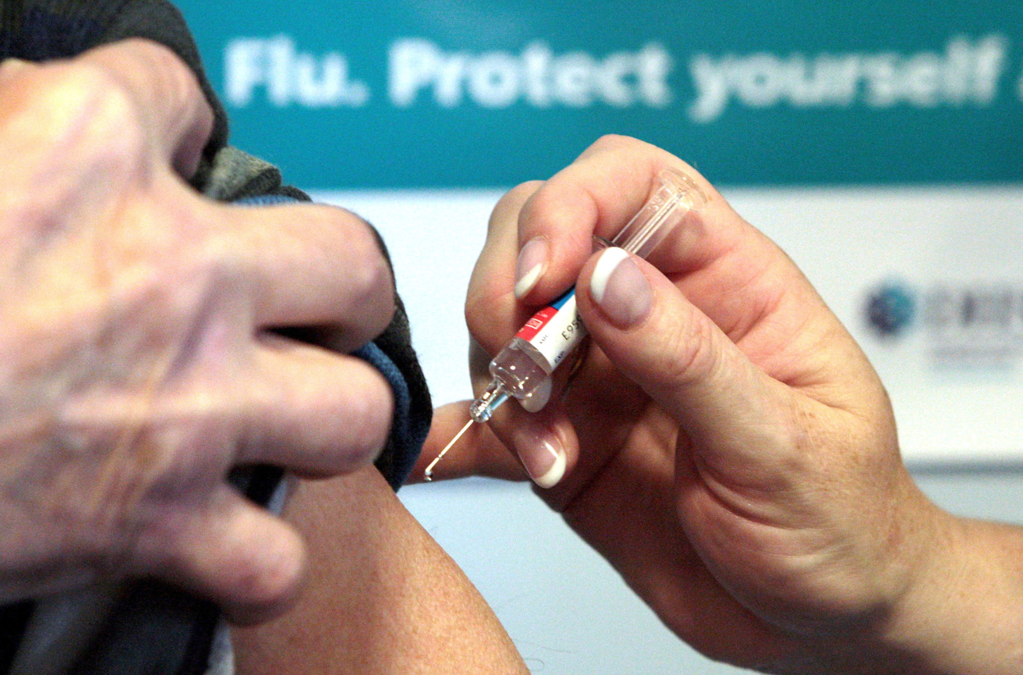 Doctors advise people to get the flu jab as hospitalisations double in just a week