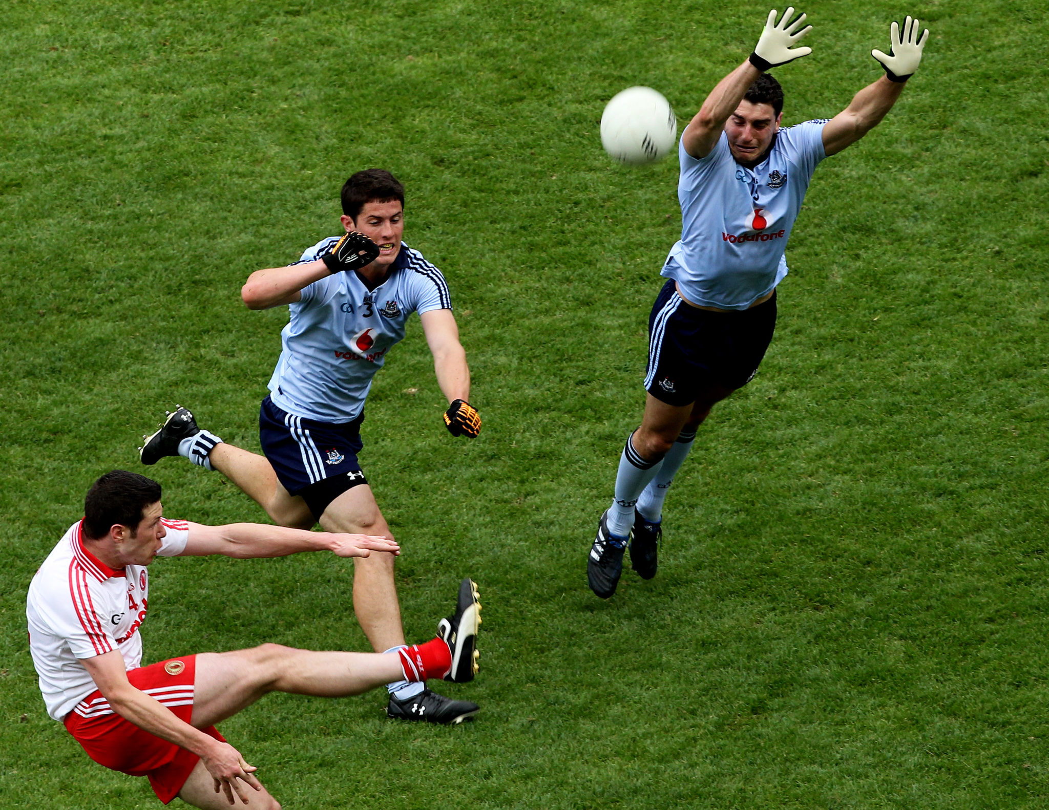 Bernard Brogan attempts to block a ball in a GAA match against Tyrone