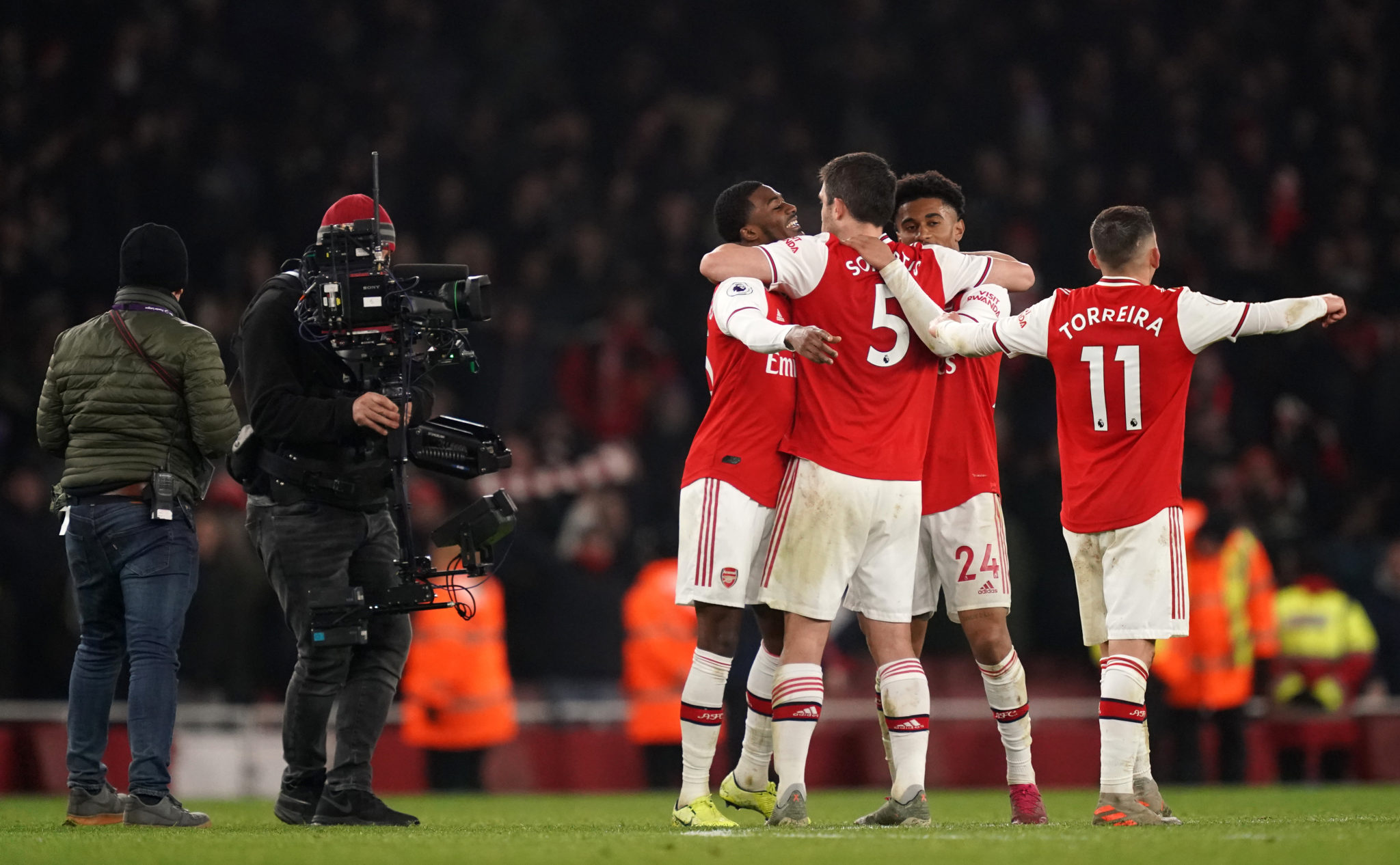 Arsenal players celebrate at the Emirates Stadium, London