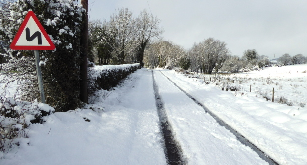 Picture of snow on a local road.