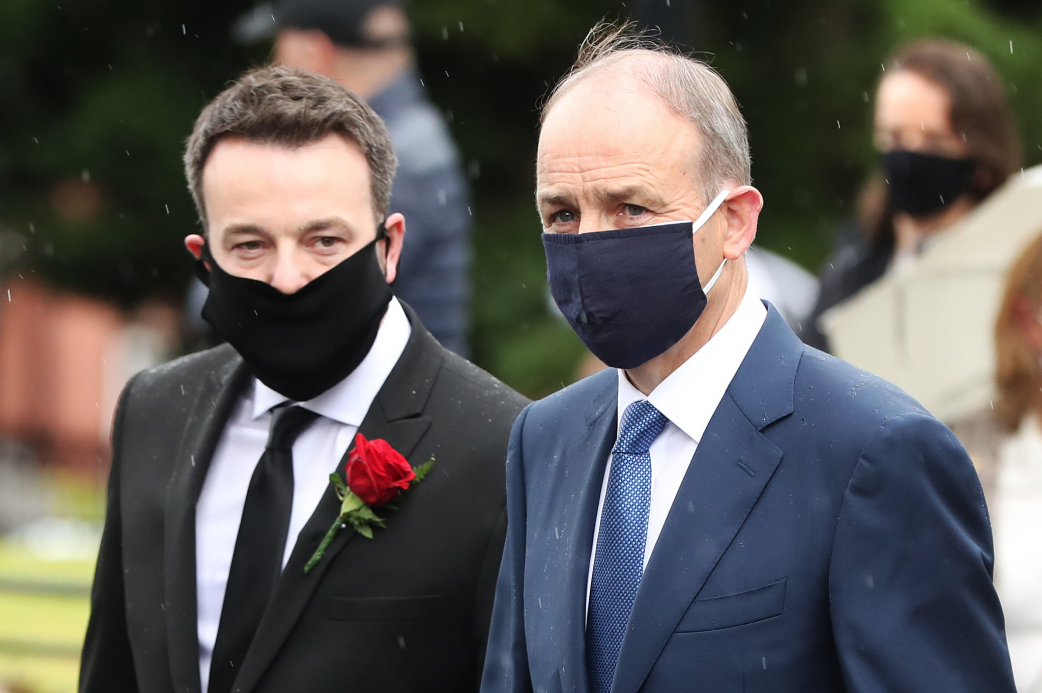 Taoiseach Micheal Martin and SDLP Leader Colum Eastwood arrive for the funeral of John Hume