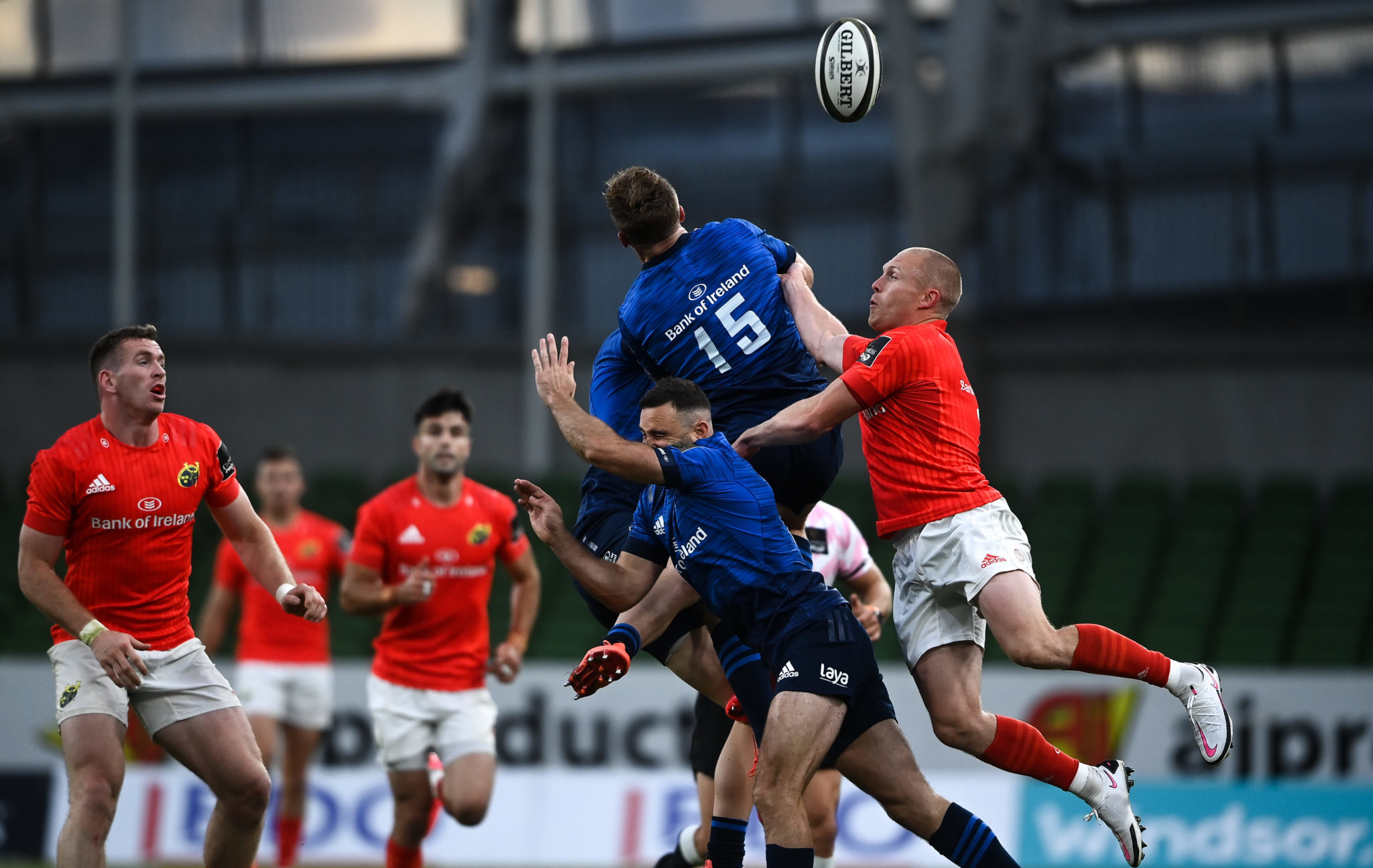 Jordan Larmour of Leinster and Keith Earls of Munster contest a high ball during the Guinness PRO14 Round 14 match between Leinster and Munster at the Aviva Stadium in Dubli