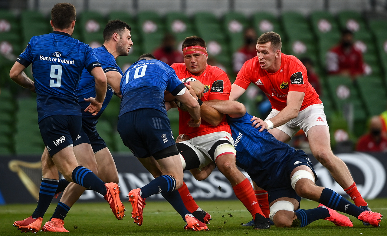 CJ Stander of Munster is tackled by Jonathan Sexton of Leinster during the Guinness PRO14 Round 14 match between Leinster and Munster