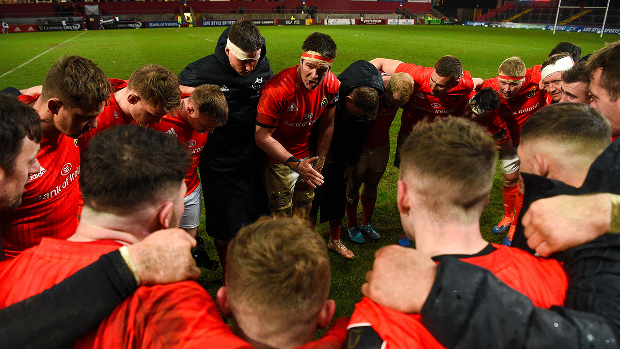 Munster captain Billy Holland speaks to his team-mates as they huddle together