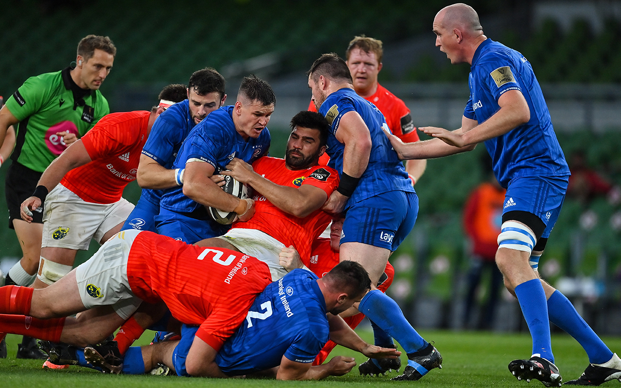 Jonathan Sexton of Leinster wins a turnover from Damian de Allende of Munster during the Guinness PRO14 Semi-Final