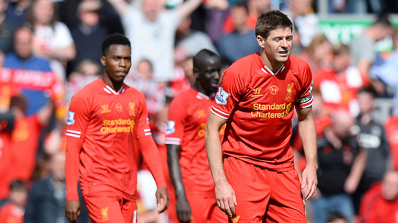 Steven Gerrard of Liverpool dejected following Chelsea's second goal