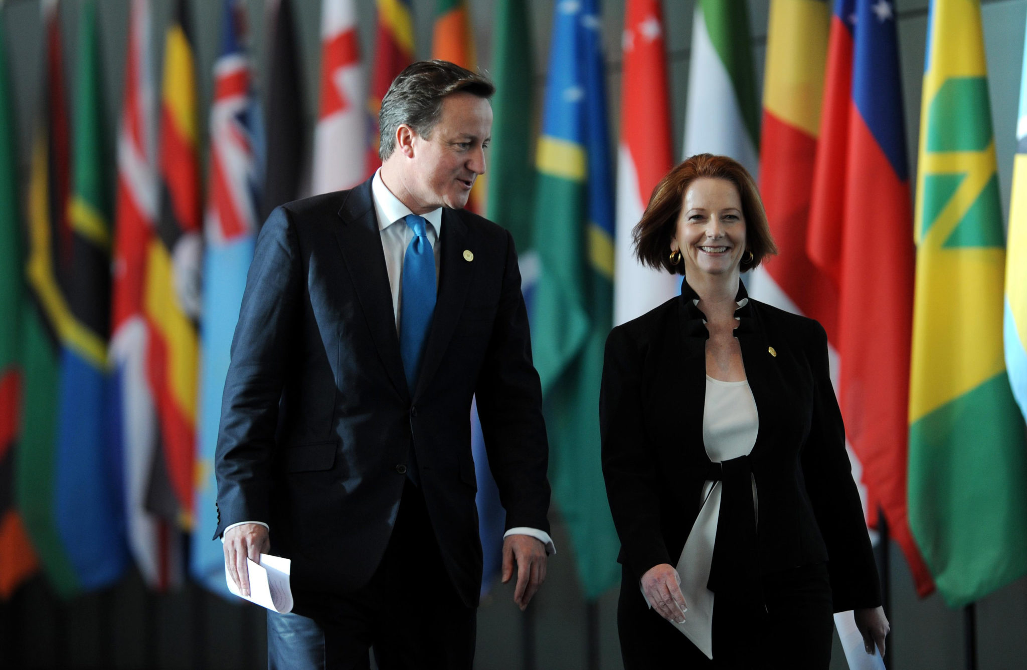 File photo of the Australian Prime Minister Julia Gillard (R) with UK Prime Minister David Cameron (L) in Perth, Australia