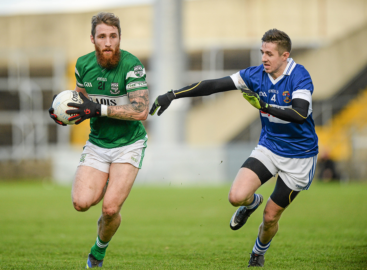 Zach Tuohy, Portlaoise, in action against Hugh Gill, St Vincent's. AIB Leinster GAA Football Senior Club Championship