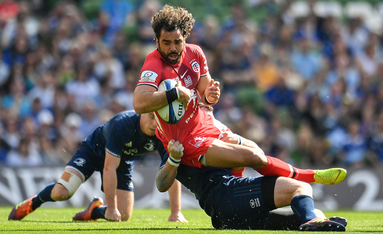 Yoann Huget of Toulouse is tackled by Robbie Henshaw of Leinster during the Heineken Champions Cup Semi-Final match between Leinster and Toulouse at the Aviva