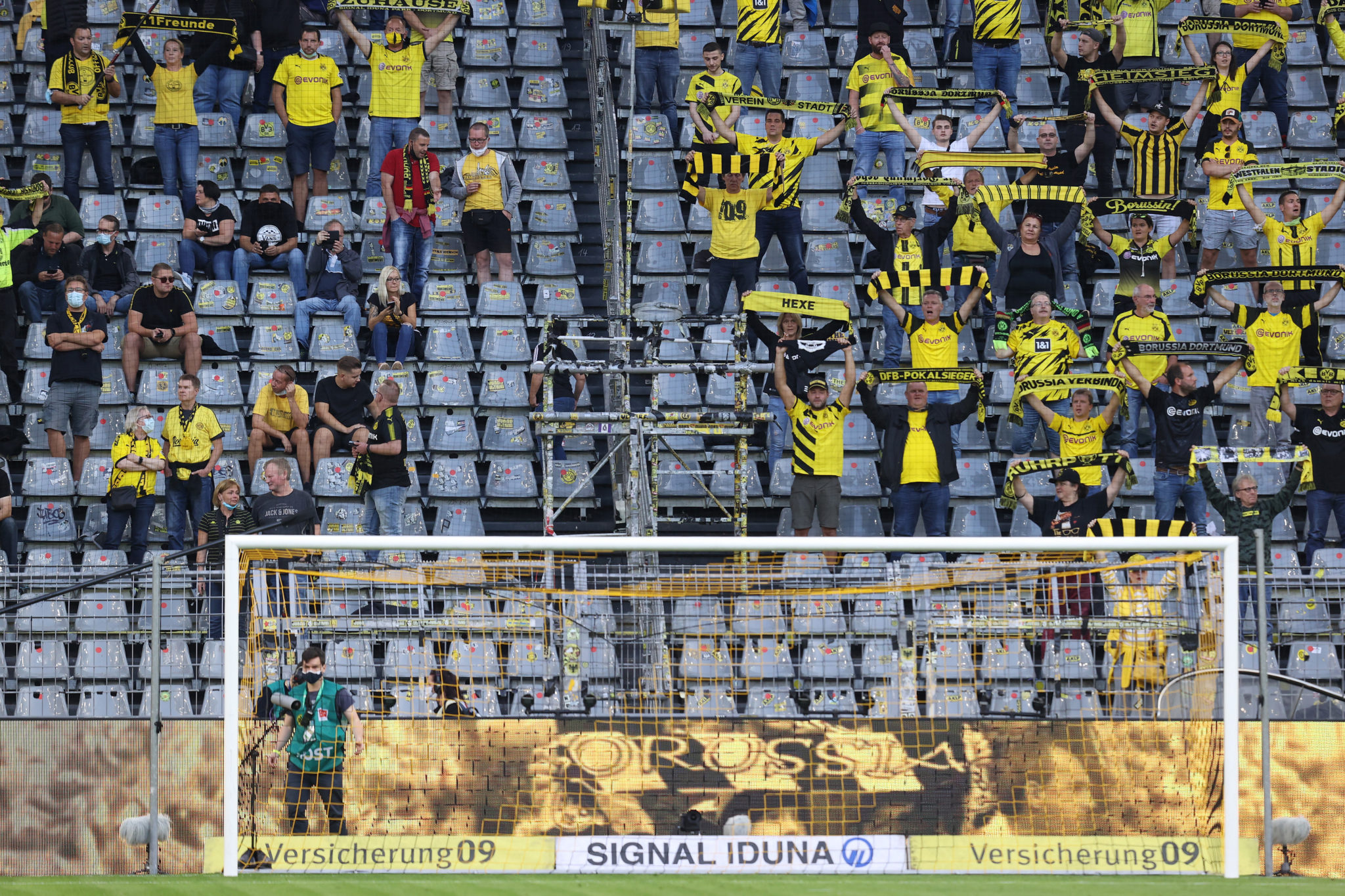 Socially distanced football supporters during Borussia Dortmund vs Borussia Monchengladbach.