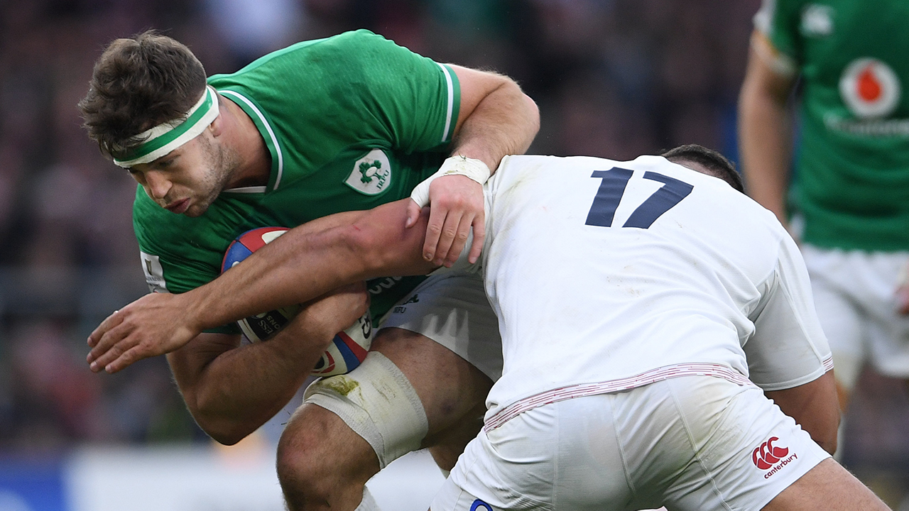 Caelan Doris of Ireland in action against Ellis Genge of England during the Guinness Six Nations Rugby Championship match between England and Ireland at Twickenham Stadium in London, England