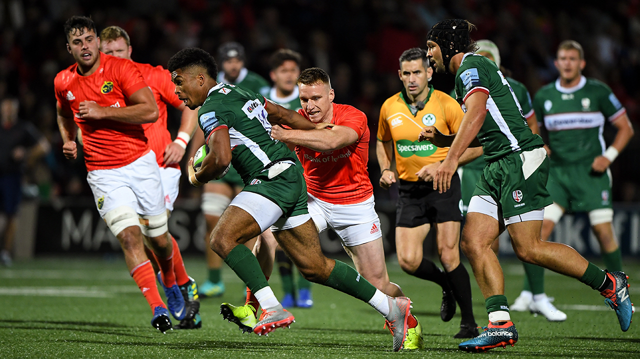 Ben Loader of London Irish is tackled by Rory Scannell of Munster during the Pre-season friendly match between Munster and London Irish at the Irish Independent Park in Cor