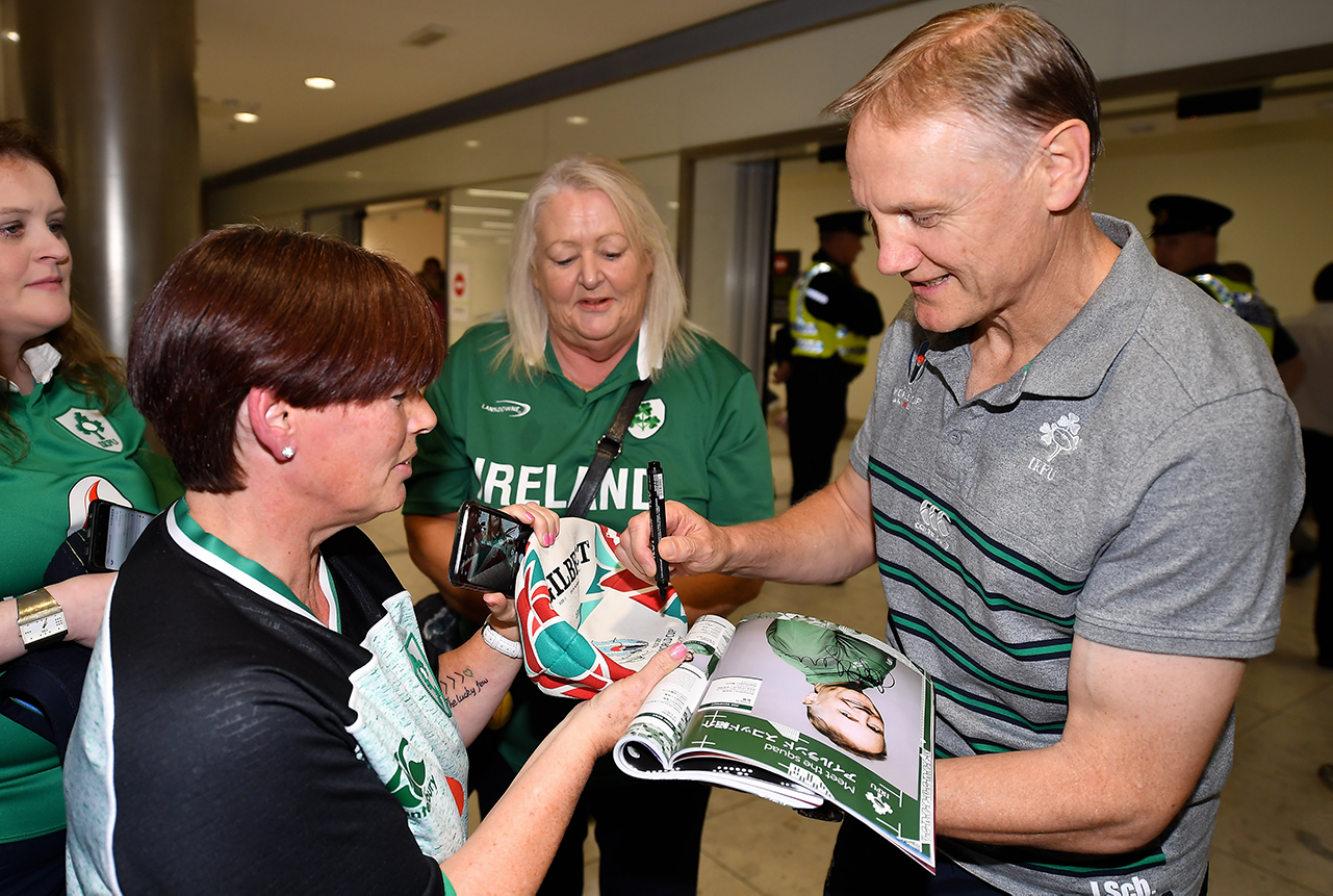 Head coach Joe Schmidt is greeted by supporters on the Ireland Rugby Team's return at Dublin Airport from the Rugby World Cup