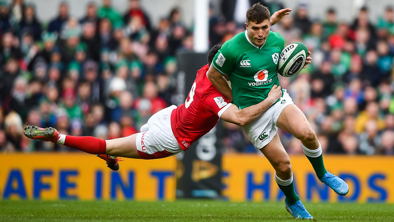 Jordan Larmour of Ireland is tackled by Tomos Williams of Wales during the Guinness Six Nations Rugby Championship match between Ireland and Wales at Aviva Stadium in Dublin