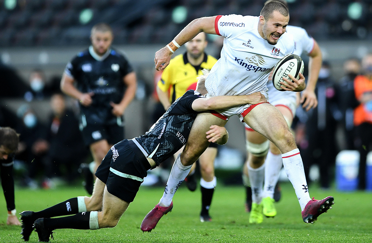 Jacob Stockdale of Ulster is tackled by Mat Protheroe of Ospreys during the Guinness PRO14 match between Ospreys and Ulster at Liberty Stadium in Swansea, Wales. 