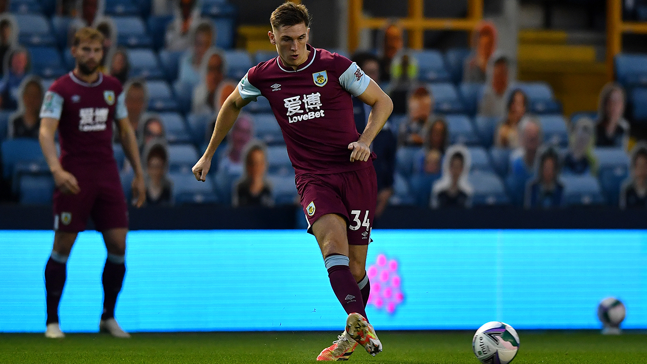 Burnley's Jimmy Dunne warming up before the Carabao Cup third round match at The New Den, London.