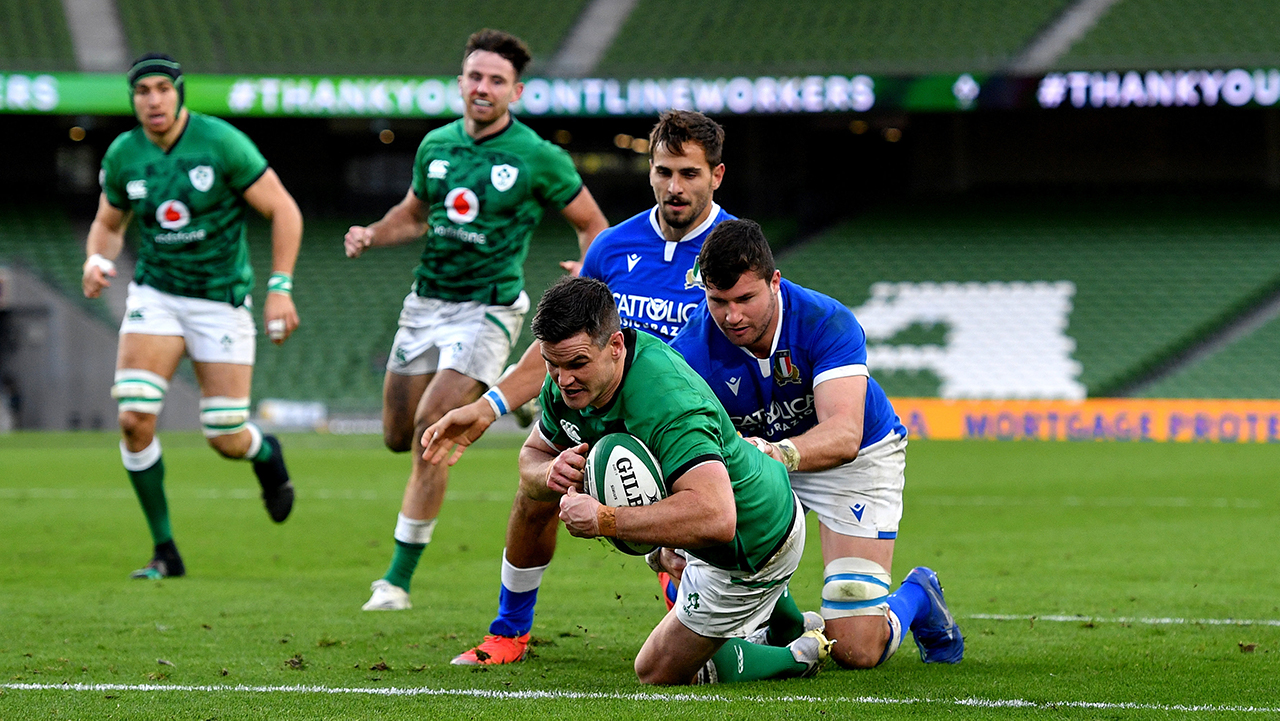 Jonathan Sexton of Ireland dives over to score his side's fifth try during the Guinness Six Nations Rugby Championship match between Ireland and Italy at the Aviva Stadium in Dublin.