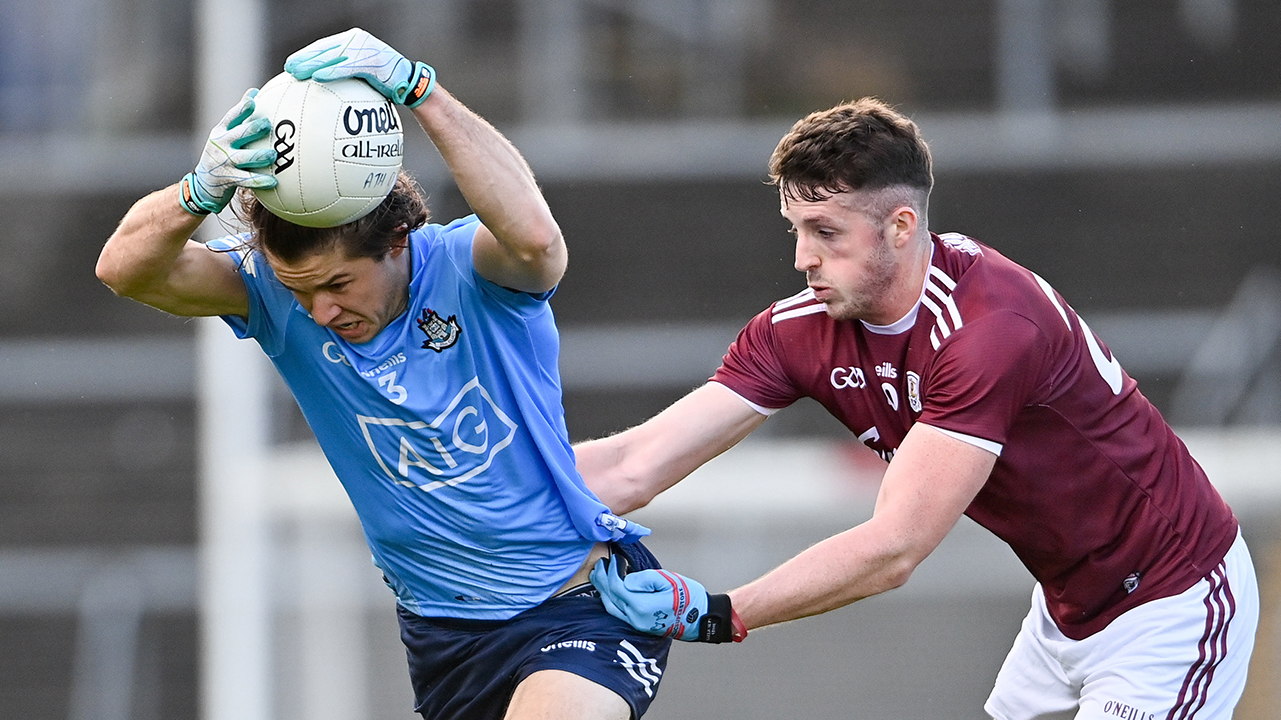 David Byrne of Dublin is tackled by Matthias Barrett of Galway during the Allianz Football League Division 1 Round 7 match between Galway and Dublin at Pearse Stadium in Galway