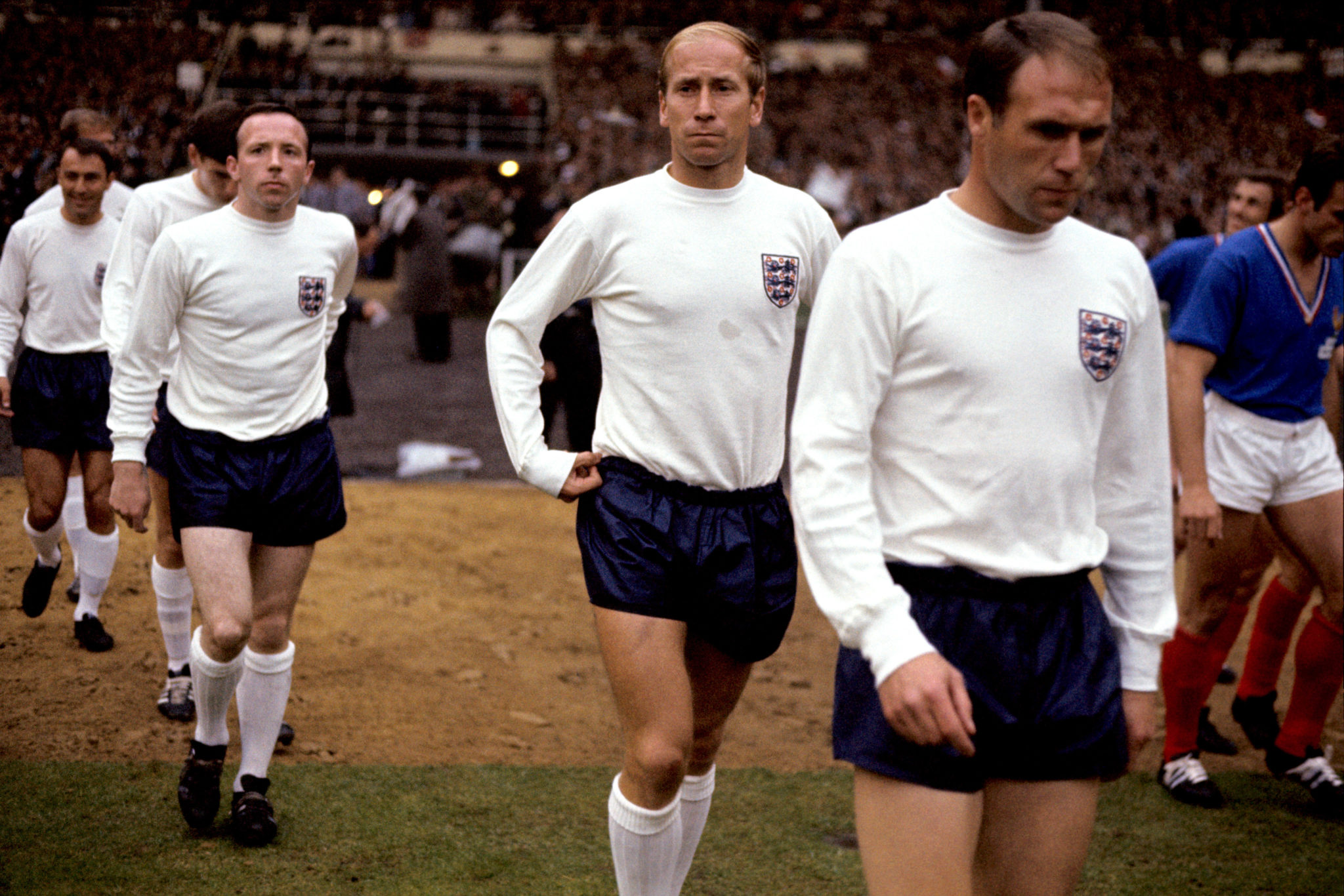 (R-L) England's Ray Wilson, Bobby Charlton, Nobby Stiles, Martin Peters, Jimmy Greaves and Jack Charlton walk out before the match