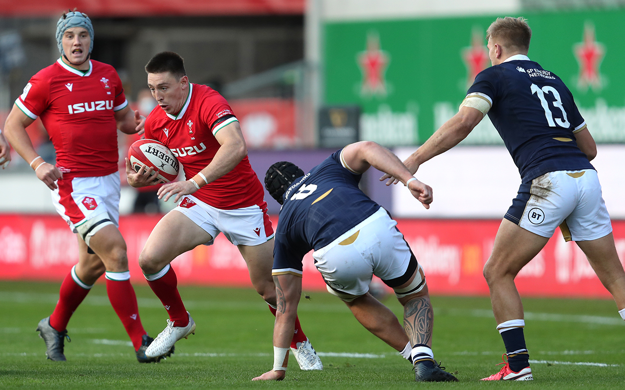 Wales' Josh Adams with the ball during the Guinness Six Nations match at Parc y Scarlets, Llanelli.