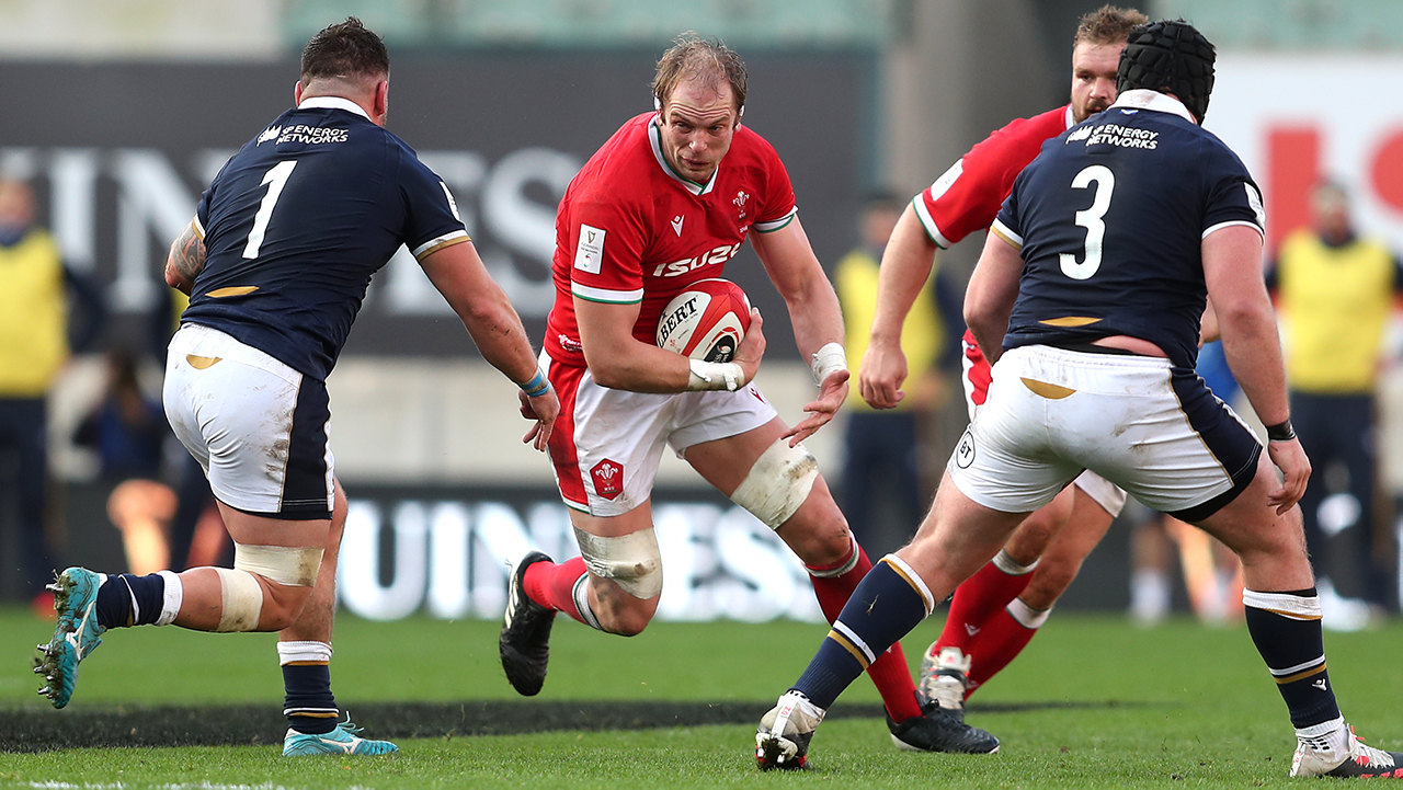 Wales' Alun Wyn Jones (centre) with the ball during the Guinness Six Nations match at Parc y Scarlets, Llanelli.