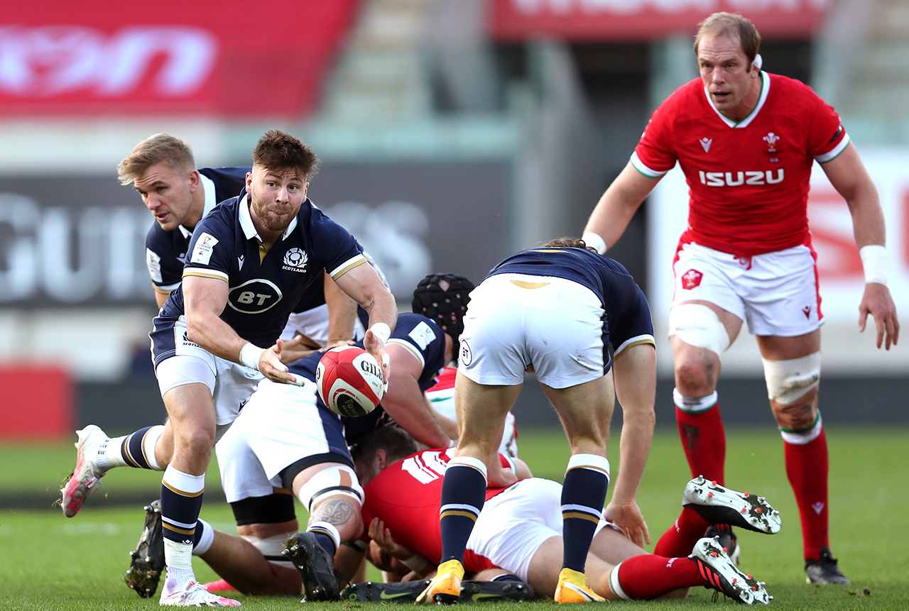 Scotland's Ali Price (left) releases the ball during the Guinness Six Nations match at Parc y Scarlets, Llanelli.