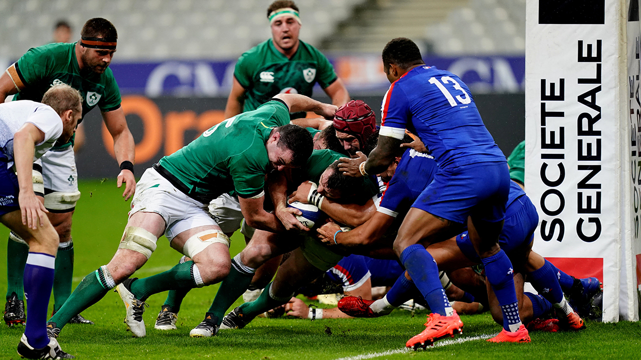 Cian Healy of Ireland, with the help of team-mate James Ryan, on the way to scoring his side's first try during the Guinness Six Nations Rugby Championship match between France and Ireland at Stade de France in Paris, France.