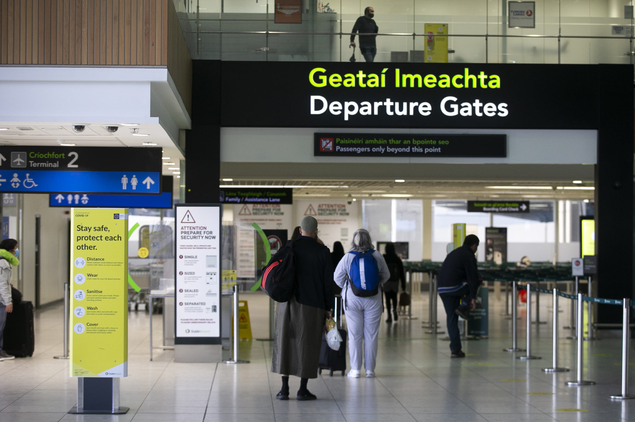 Passengers are seen in Dublin Airport in July 2020