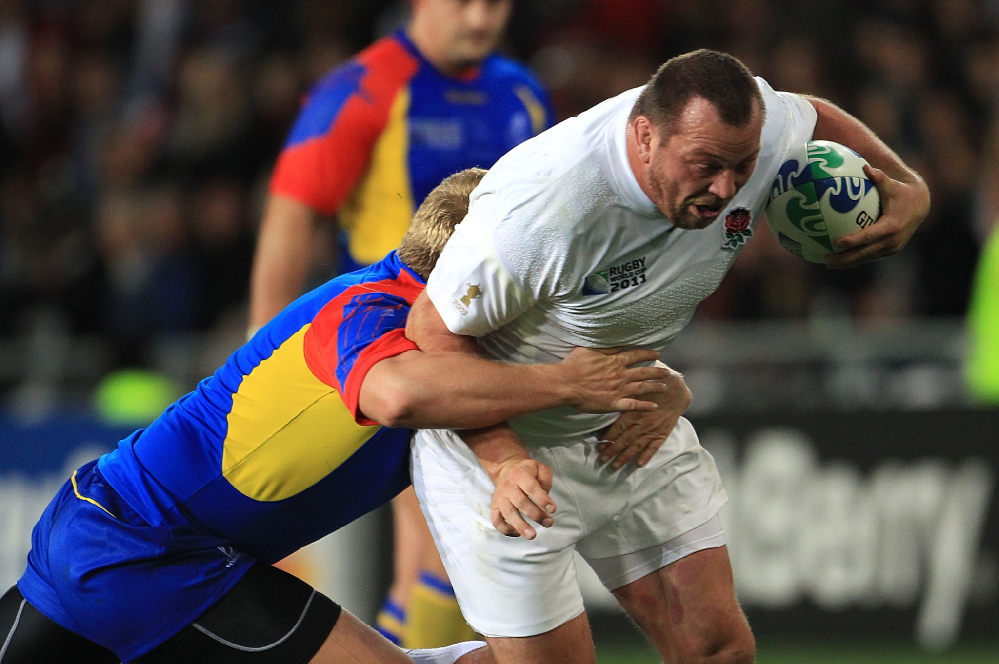 England rugby player Steve Thompson evades a tackle