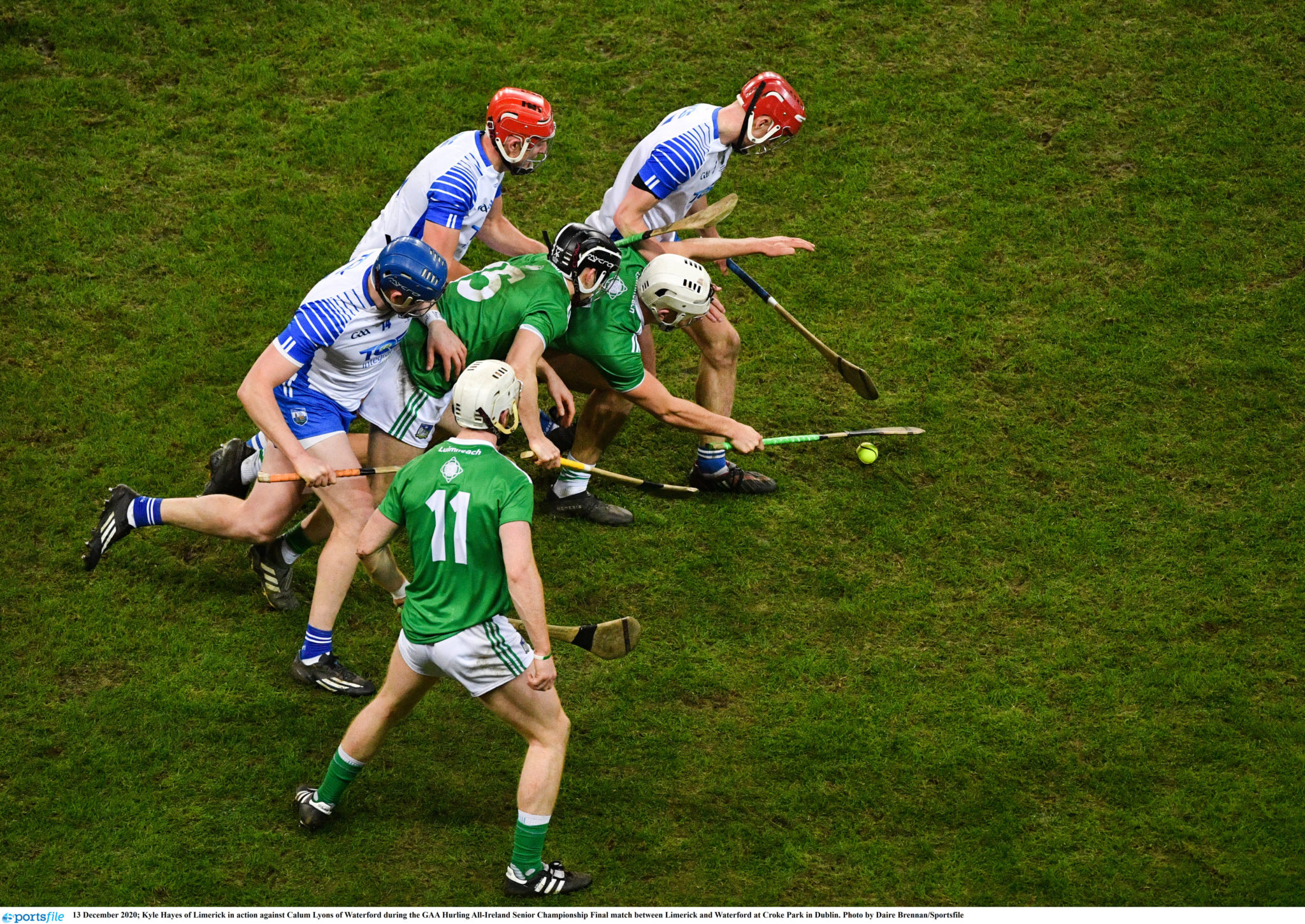 Limerick players battle with Waterford players