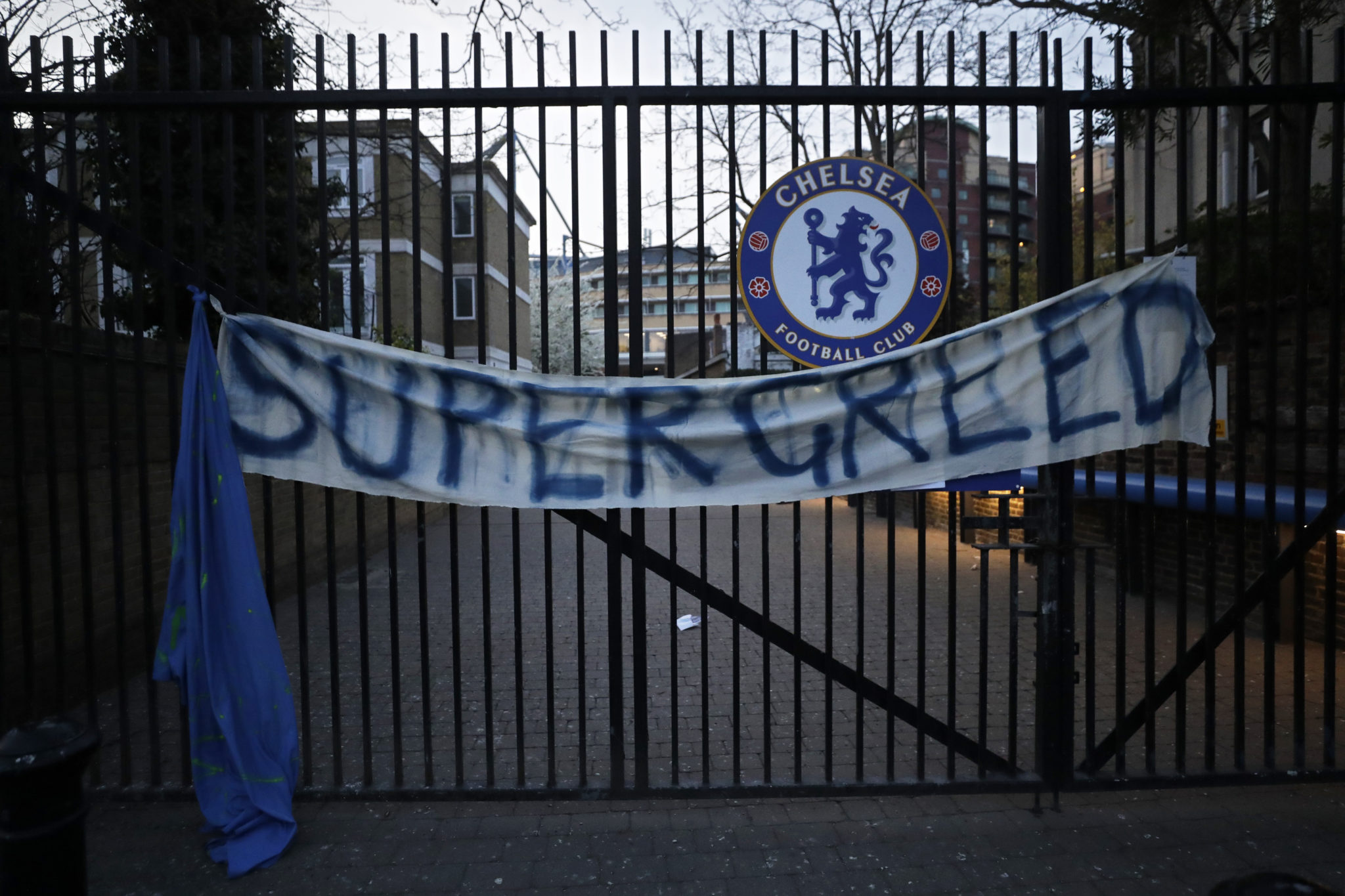 A banner hangs from one of the gates of Stamford Bridge stadium in London where Chelsea fans were protesting against Chelsea's decision to be included amongst the clubs attempting to form a new European Super League