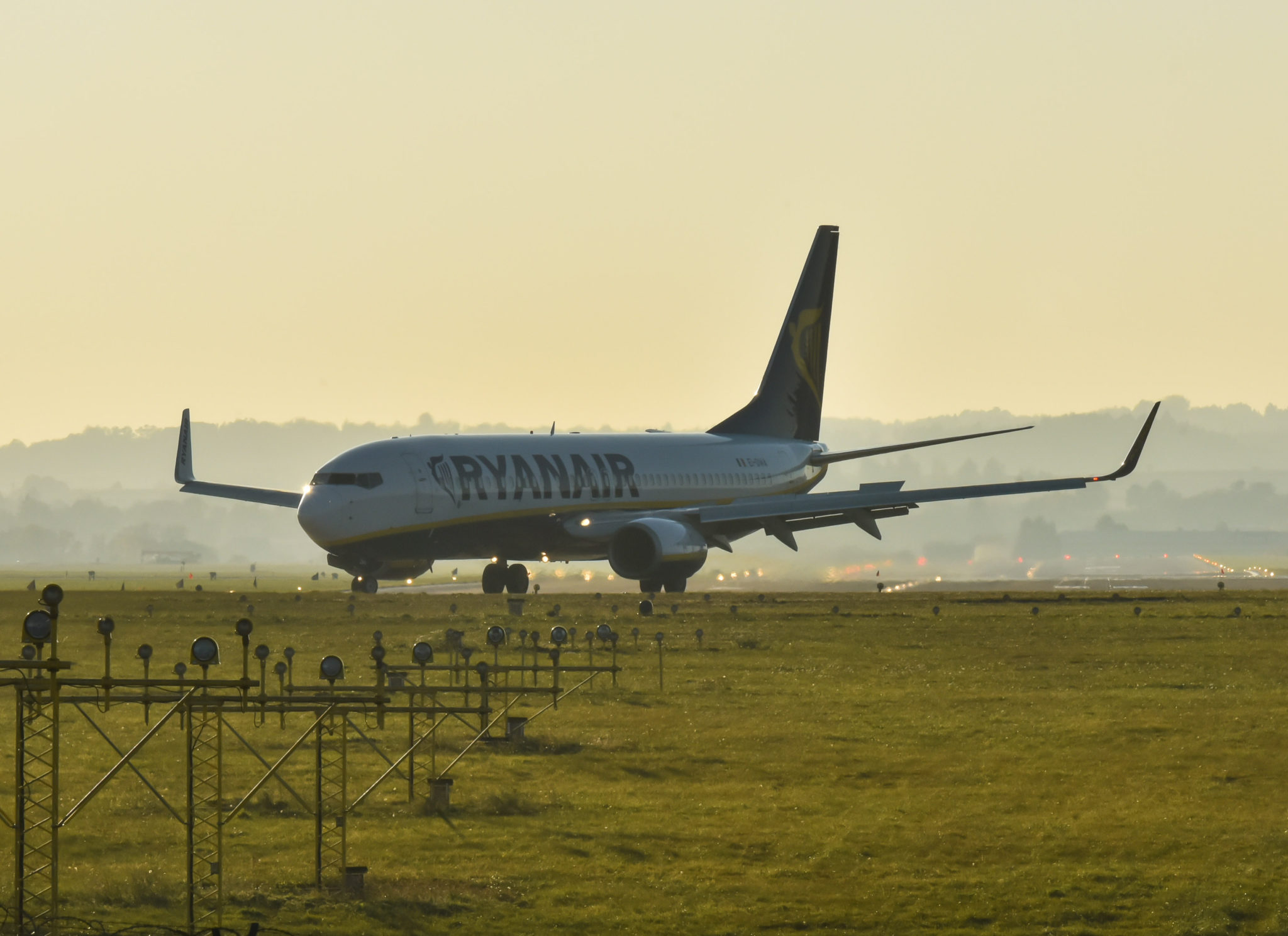 A Ryanair plane landing at an airport