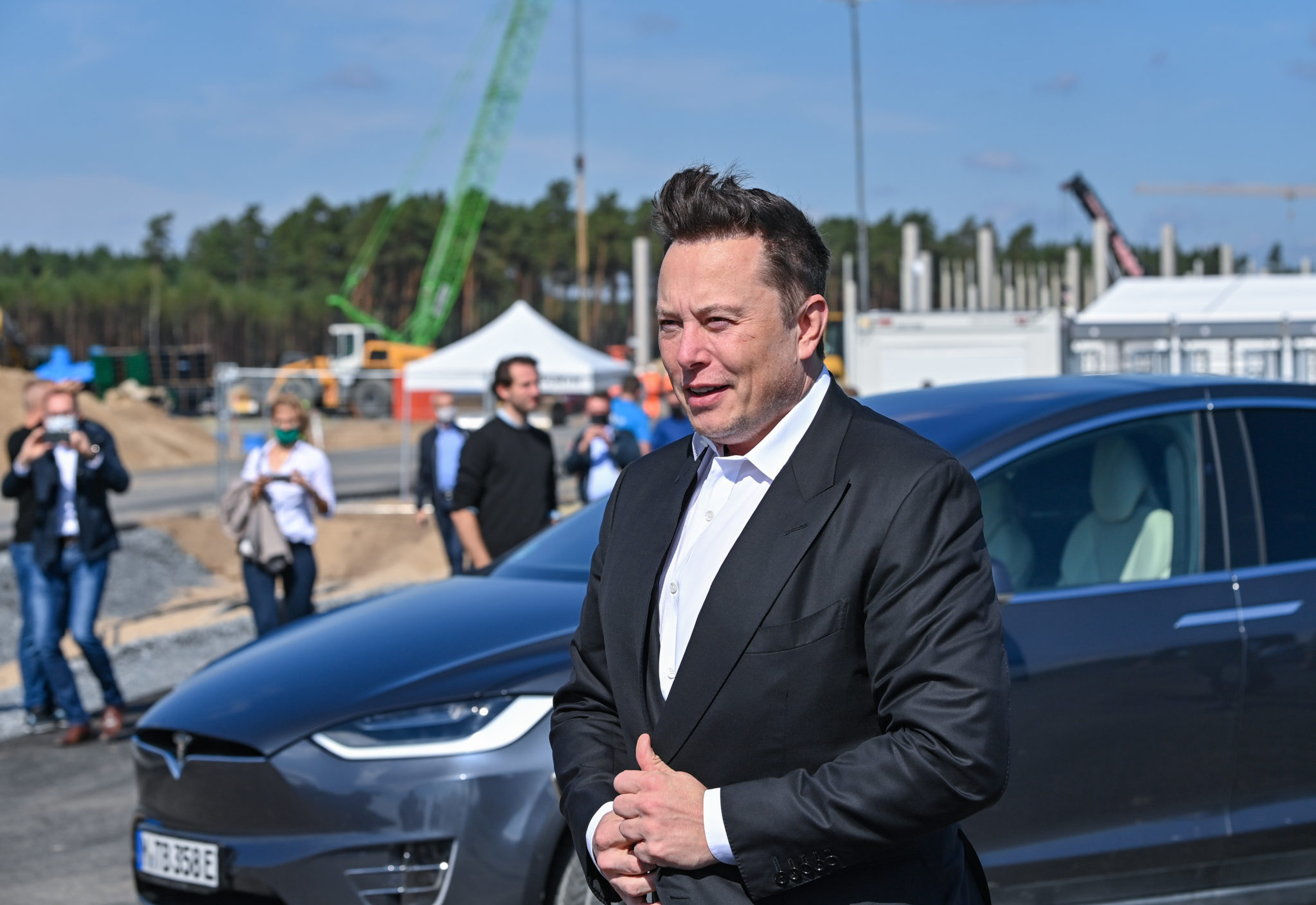 Elon Musk stands on the construction site of a Tesla factory in Germany in September 2020