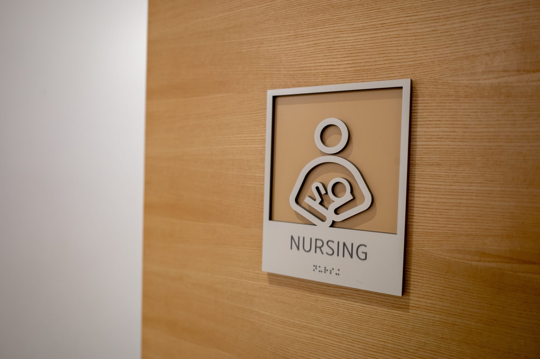 A sign for a breastfeeding room in a commercial building in the US state of California in 2019.