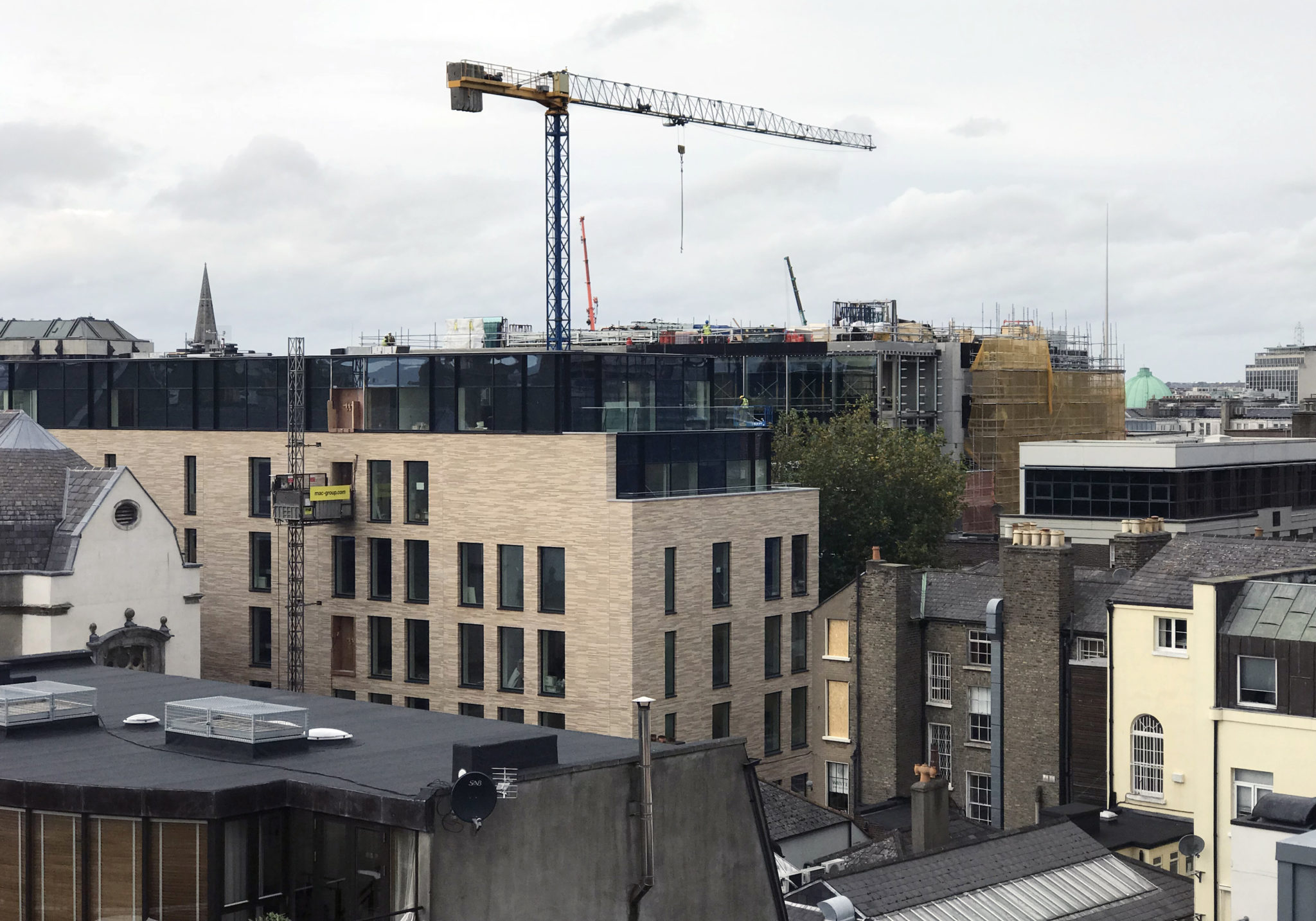 Construction cranes on a building site in Dublin.