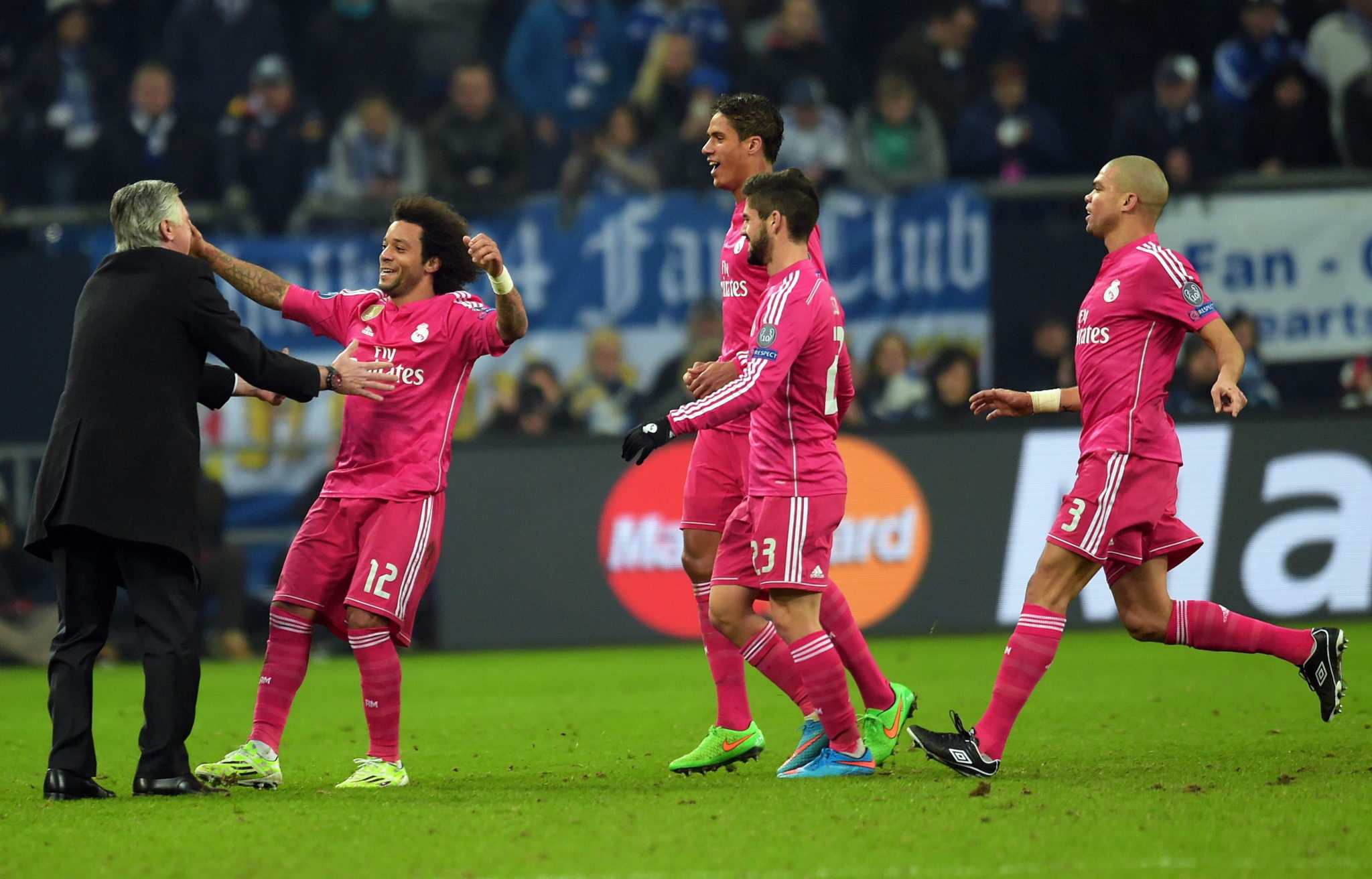 Real Madrid manager Carlo Ancelotti celebrates with players