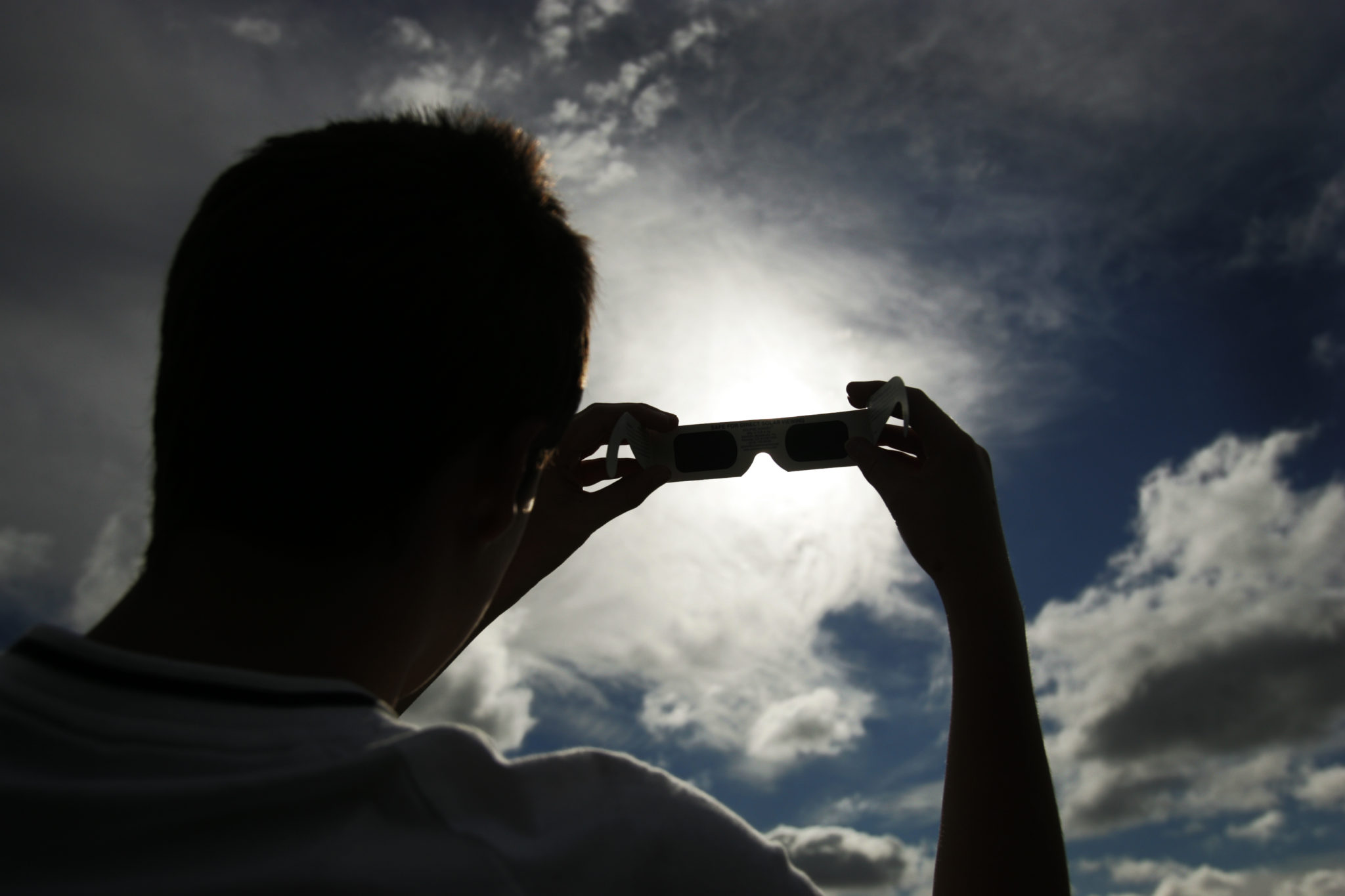 Natahan Doyle (14) puts on his Solar glasses at the Phoenix Park Dublin