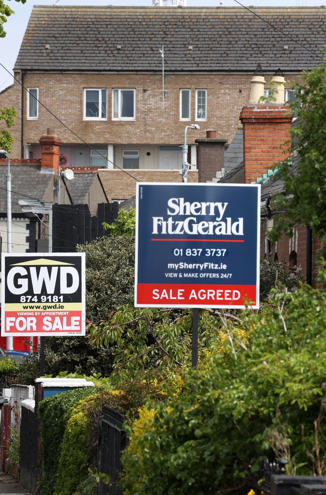 File photo of houses for sale in May 2021.