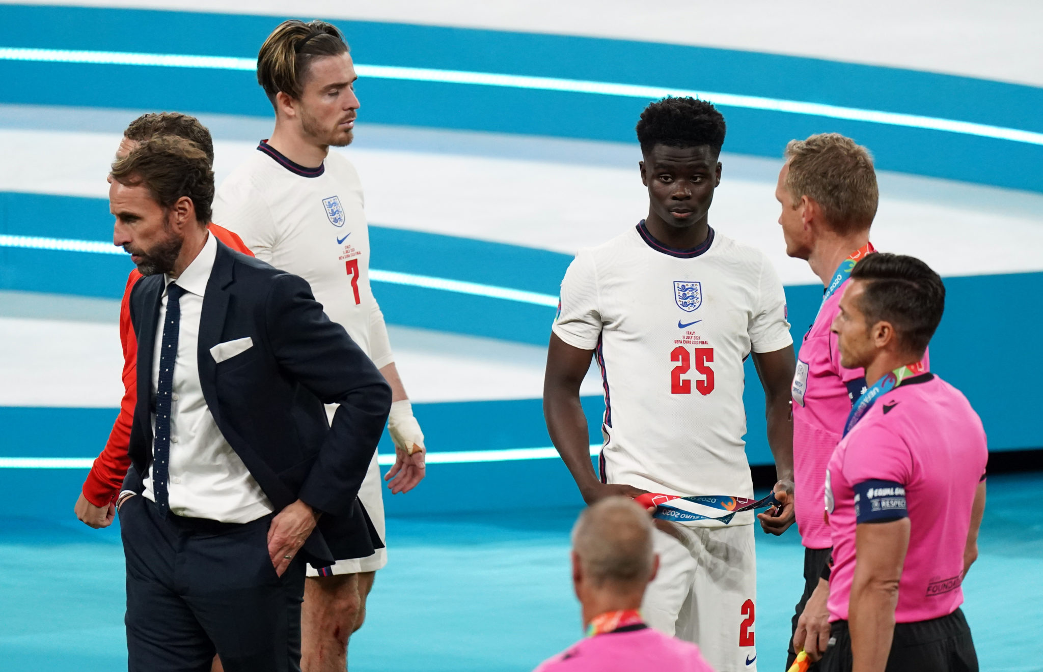 England's Bukayo Saka alongside manager Gareth Southgate following the UEFA Euro 2020 Final at Wembley Stadium in London, England.