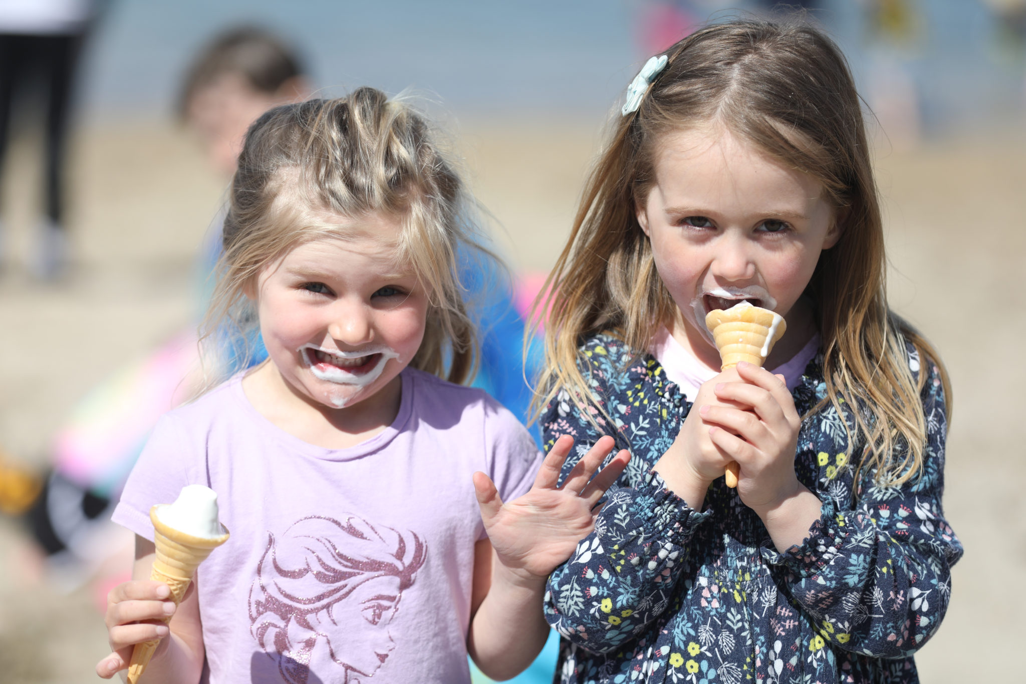 Four-year-olds Issey O'Reilly and Emile Gill-Cullen from Dublin, enjoying their ice cream cones in Sandycove