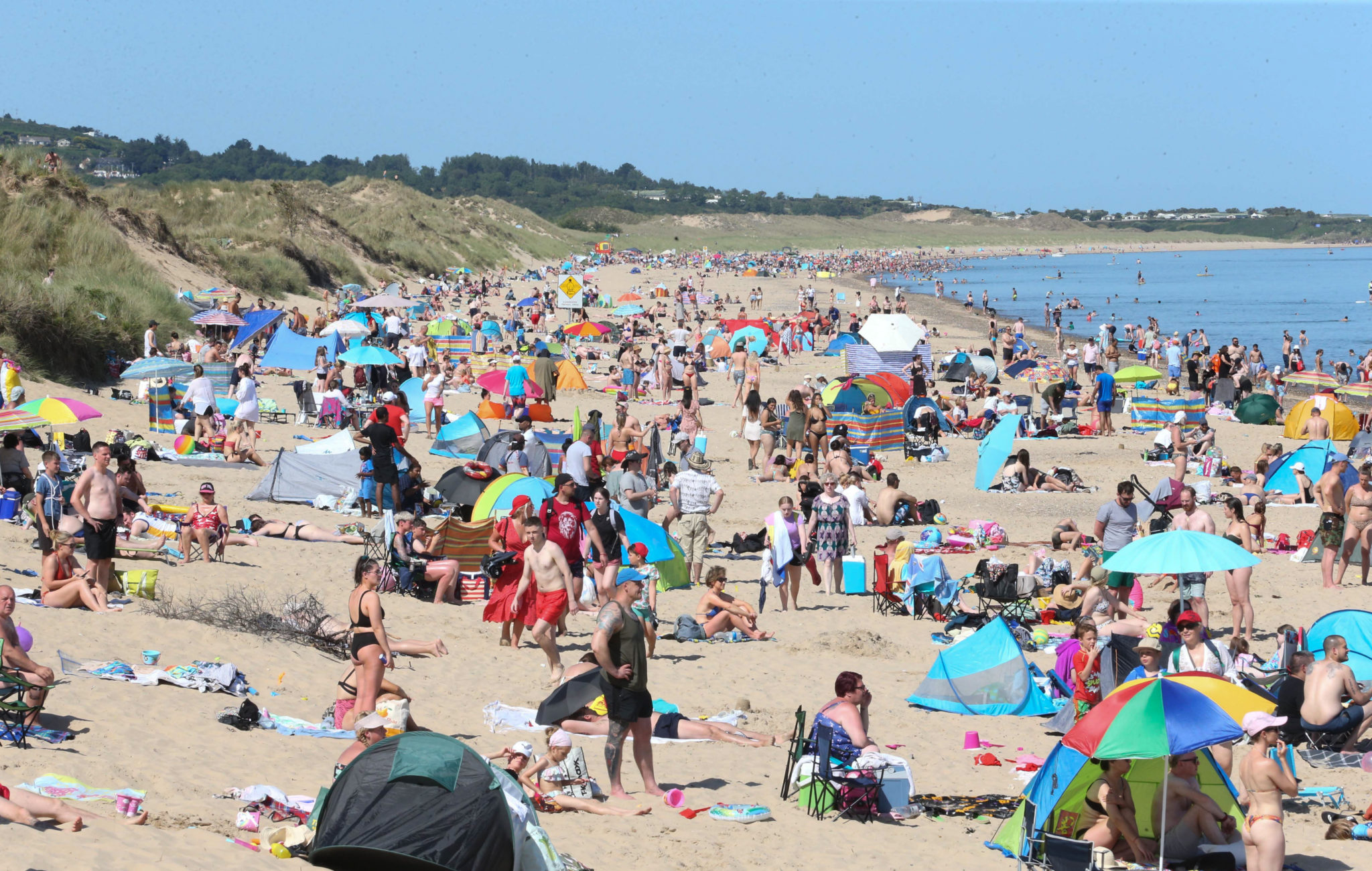 People enjoy the beach at Brittas Bay in Wicklow, 17-07-2021. Image: RollingNews