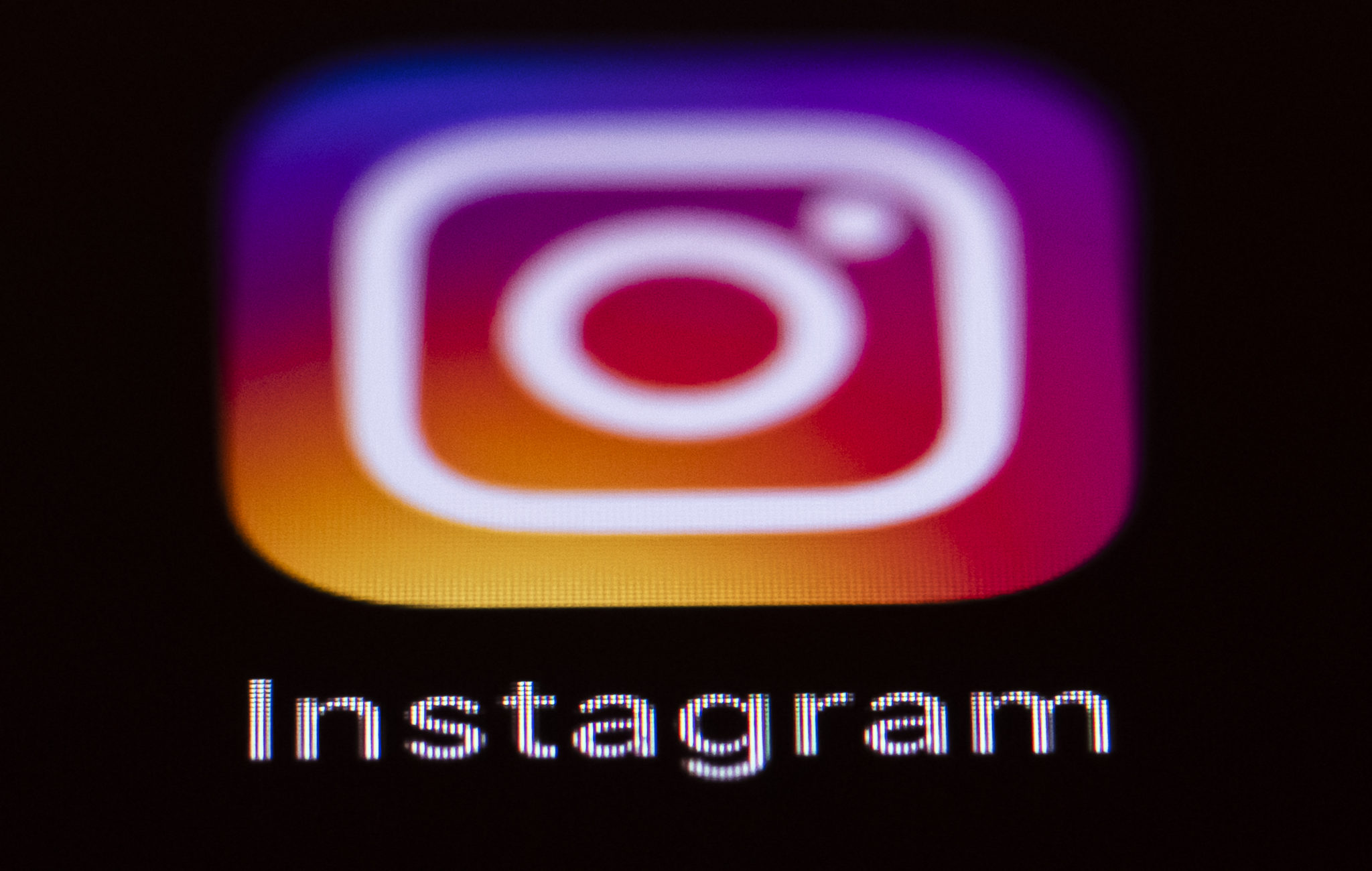 Instagram's logo can be seen on a smartphone display in September 2019. 