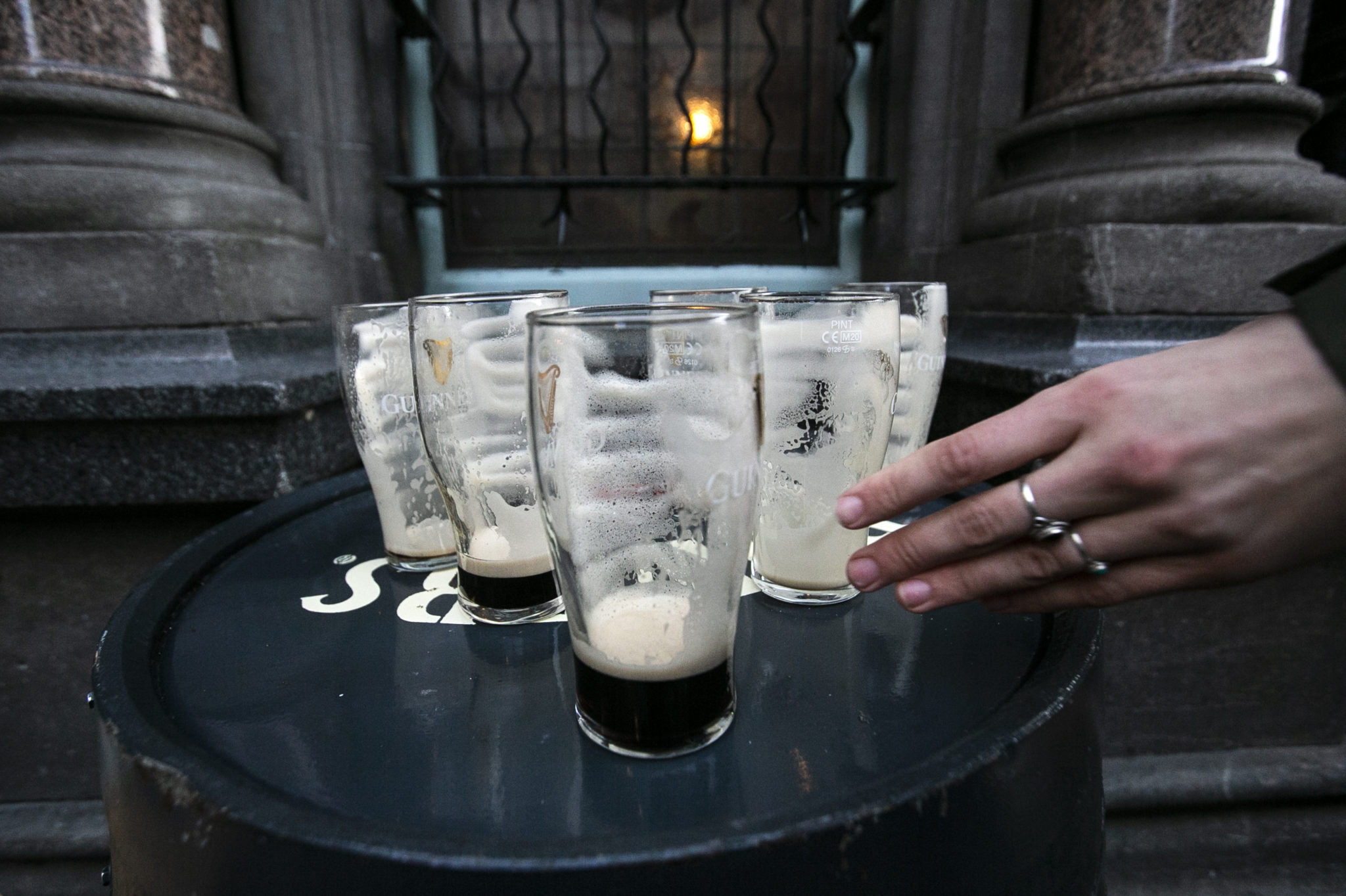 Empty pints of Guinness as pubs close in Dublin city centre, 24-12-20. 