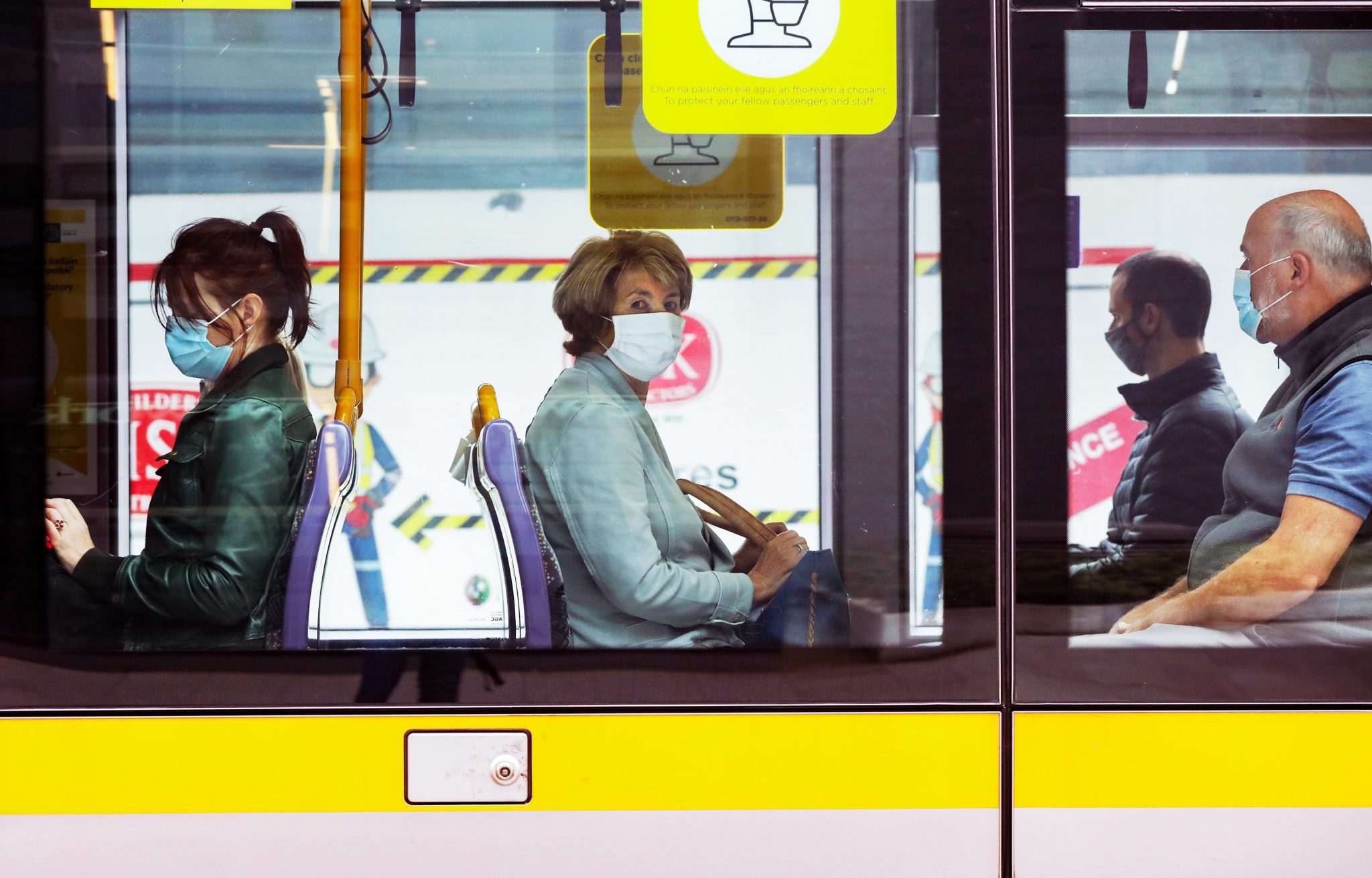 Passengers wearing face masks on the Luas