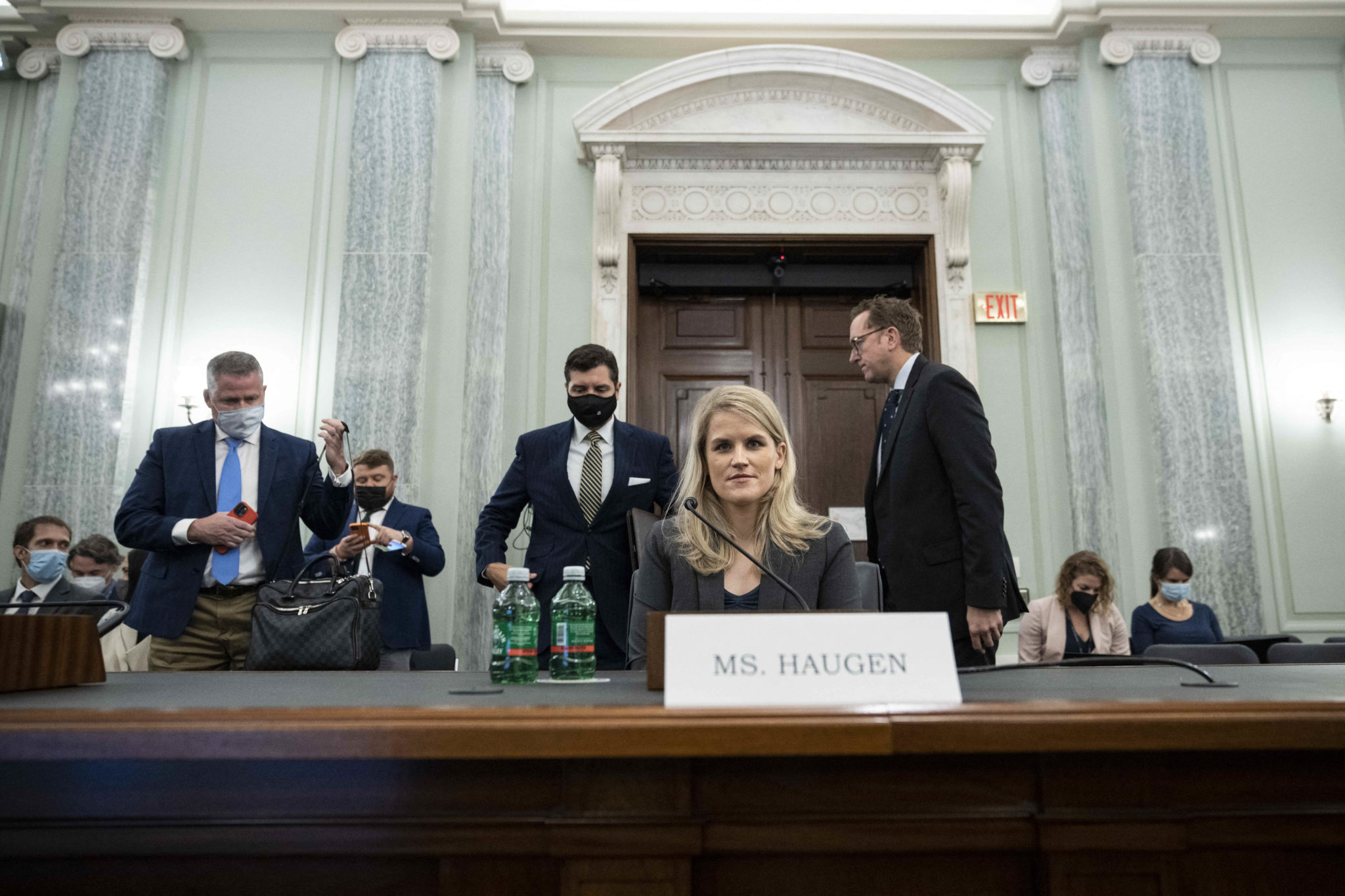Former Facebook employee Frances Haugen prepares to leave at the end of a US Senate committee hearing entitled 'Protecting Kids Online: Testimony from a Facebook Whistleblower' on Capitol Hill in Washington, DC