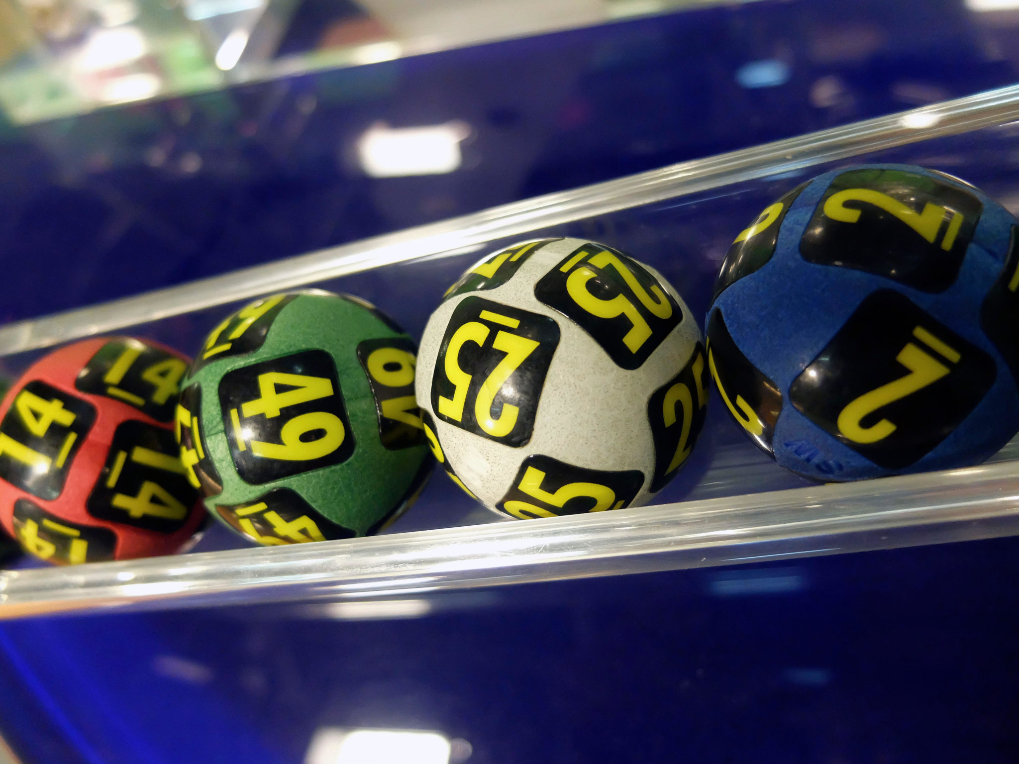 Lottery balls are seen during a draw of numbers in March 2016