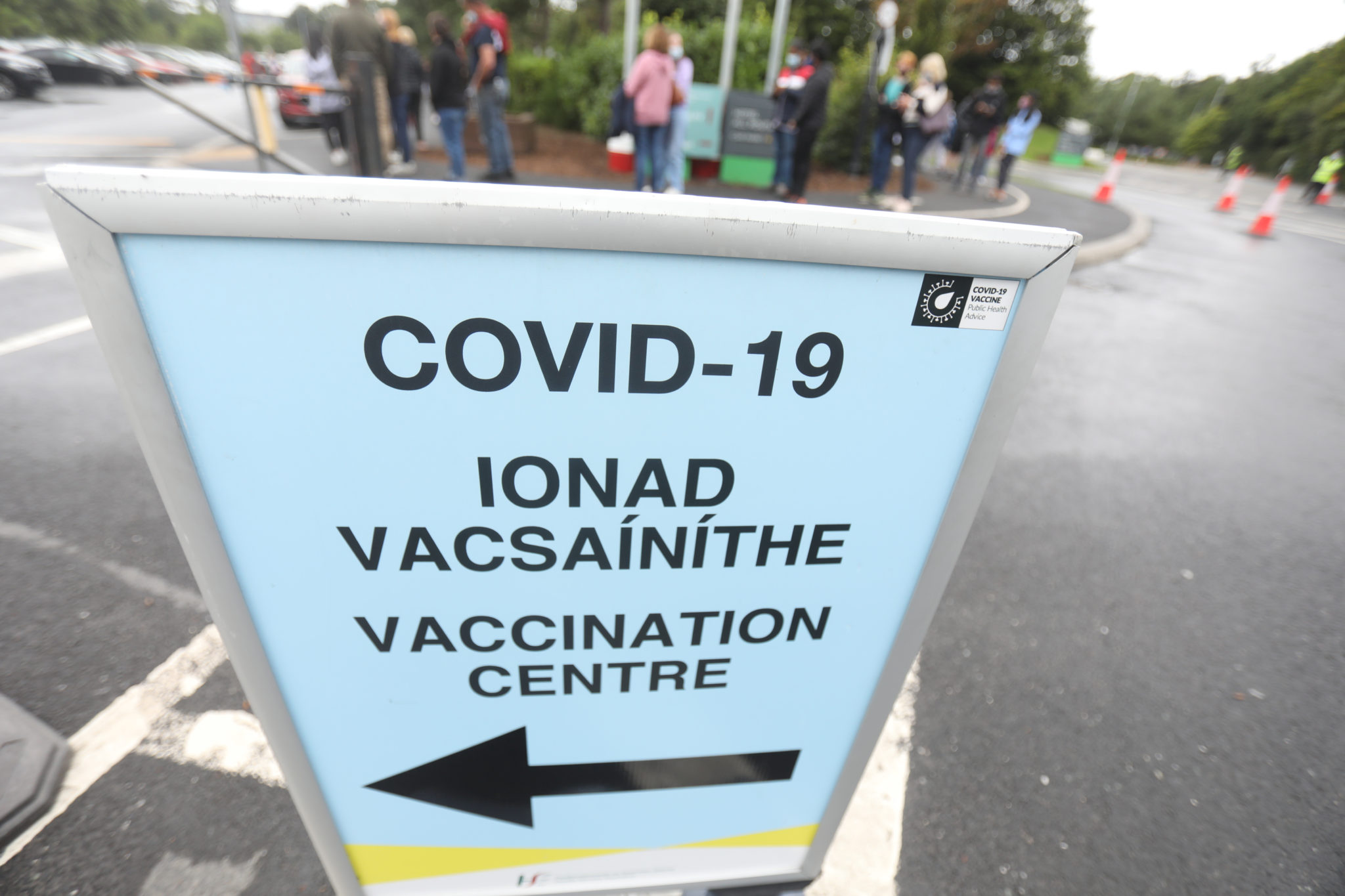 People queue outside a vaccine centre