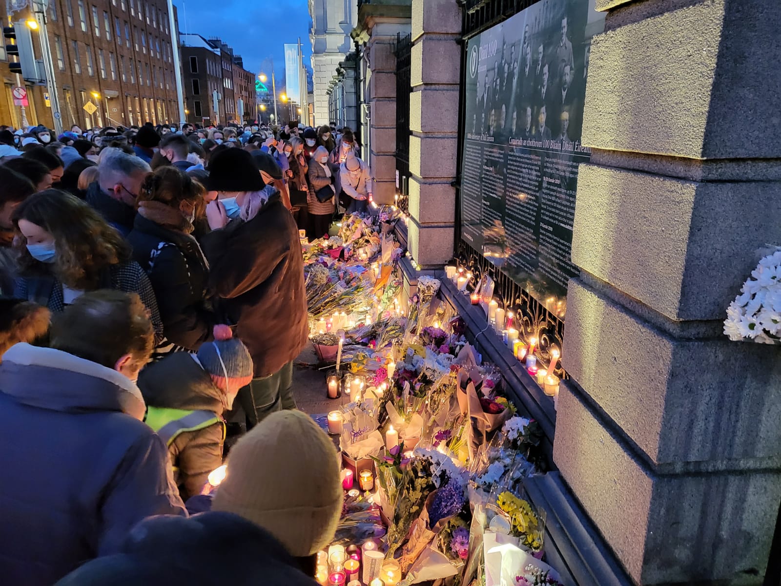Candle tributes are left beside the Dáil in Dublin city